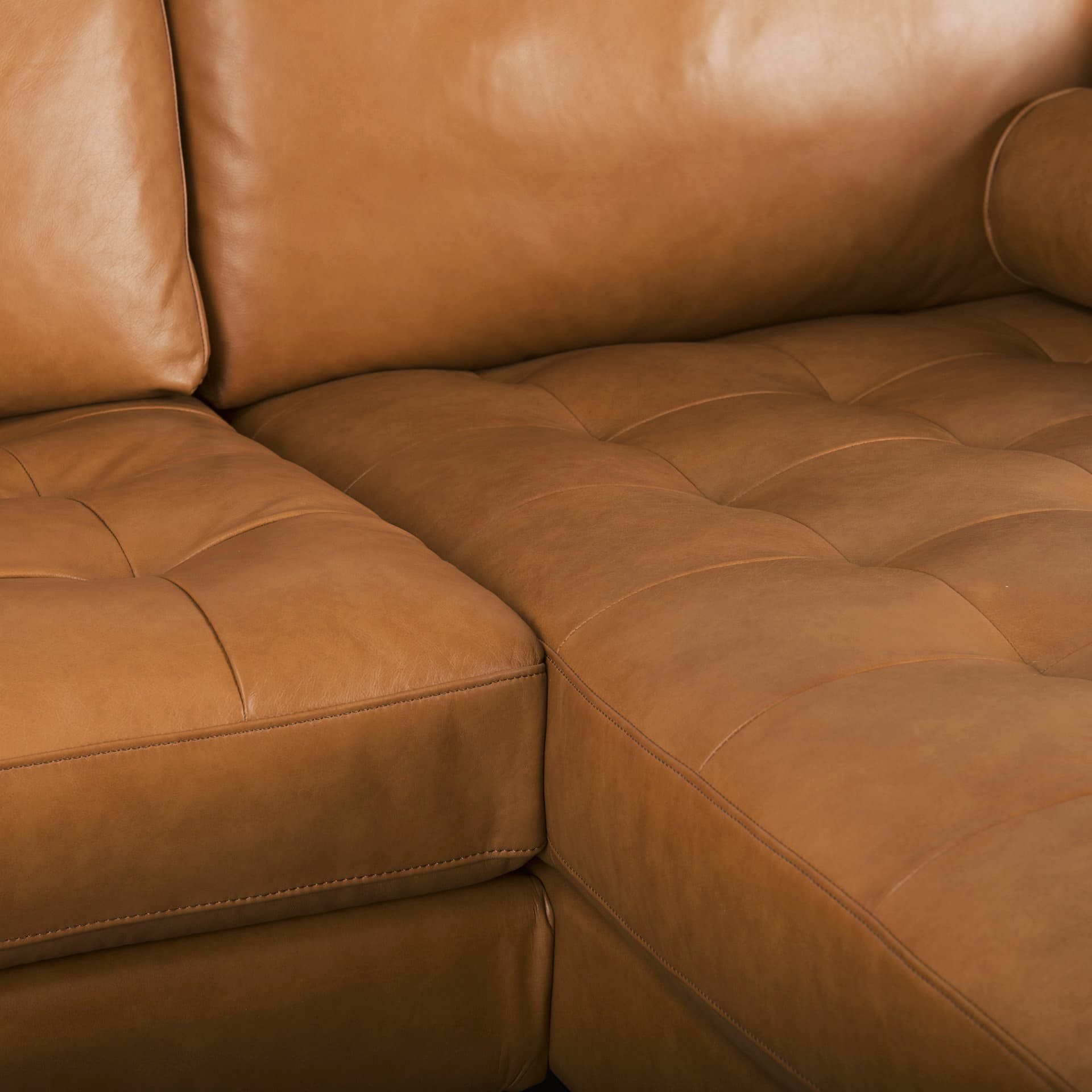 Svend 111.4L x 68.0W x 33.9H Tan Leather Right Chaise Sectional Sofa — product photograph