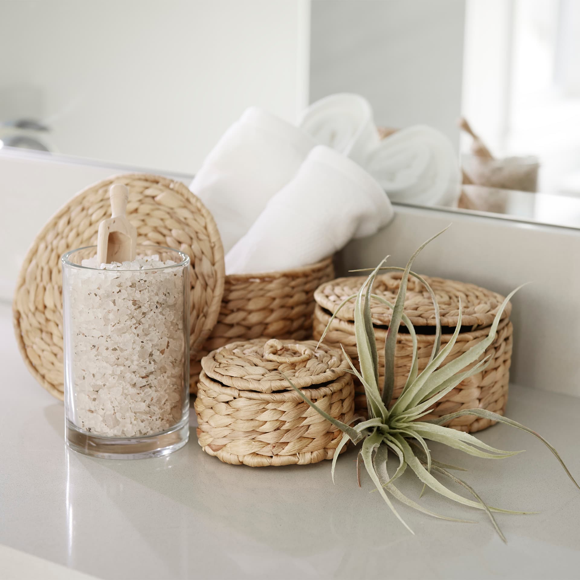 Kea Set of 3 Nesting Water Hyacinth Boxes with Lids — in a styled room