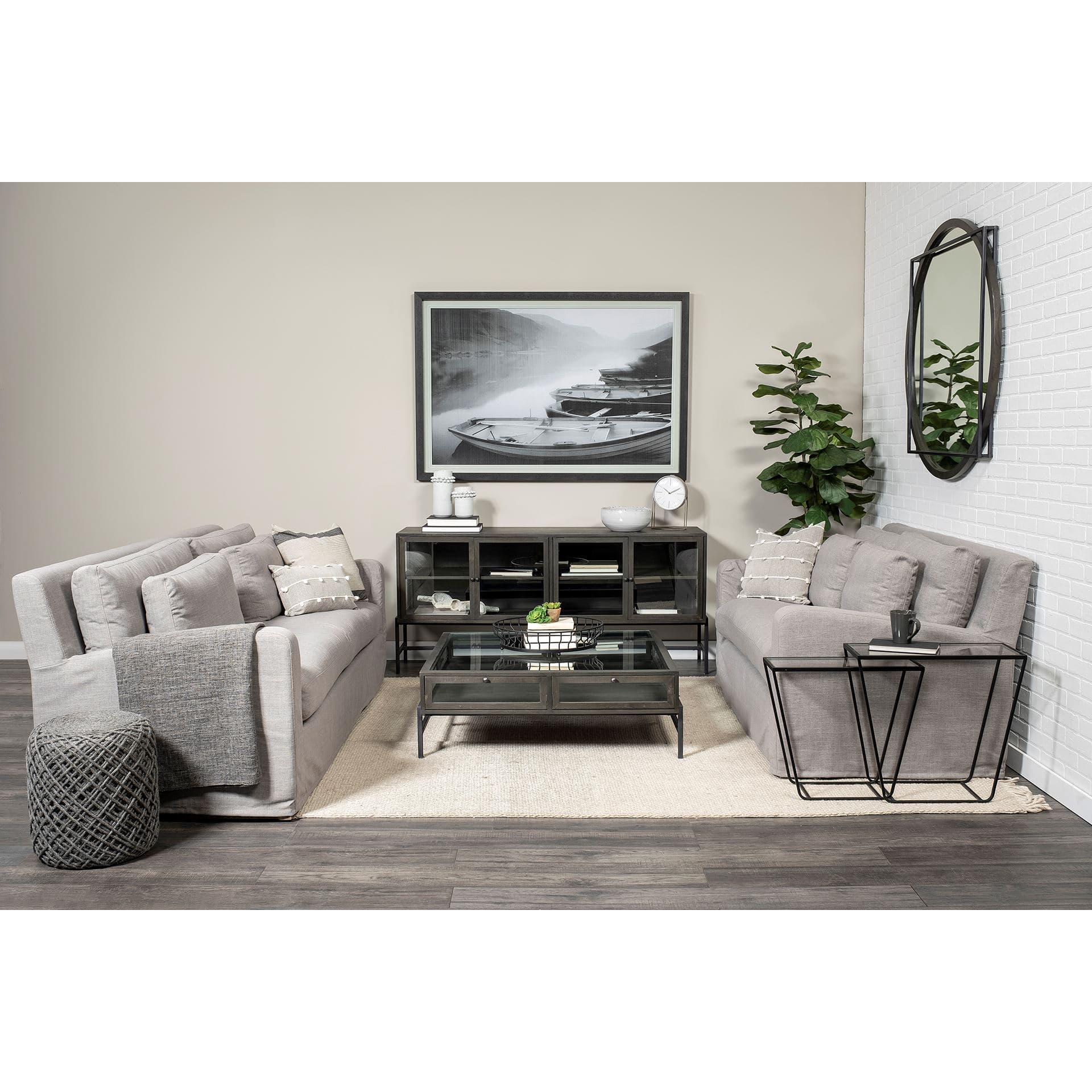 Arelius 70L x 18.75W x 32H Black-Brown Wood, Black Metal Base w/ 4 Glass Cabinet Doors Sideboard — in a styled room