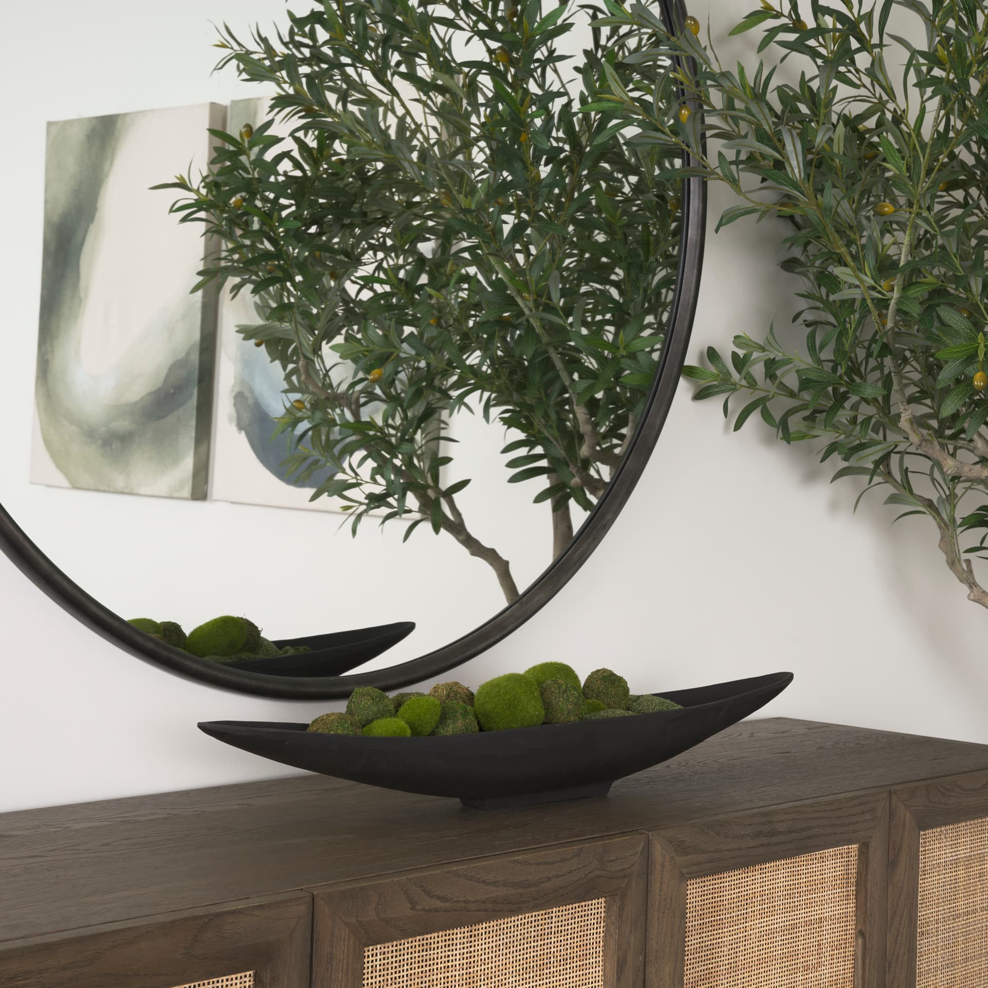 Piero Small Matte Black Metal Decorative Bowl — in a styled room