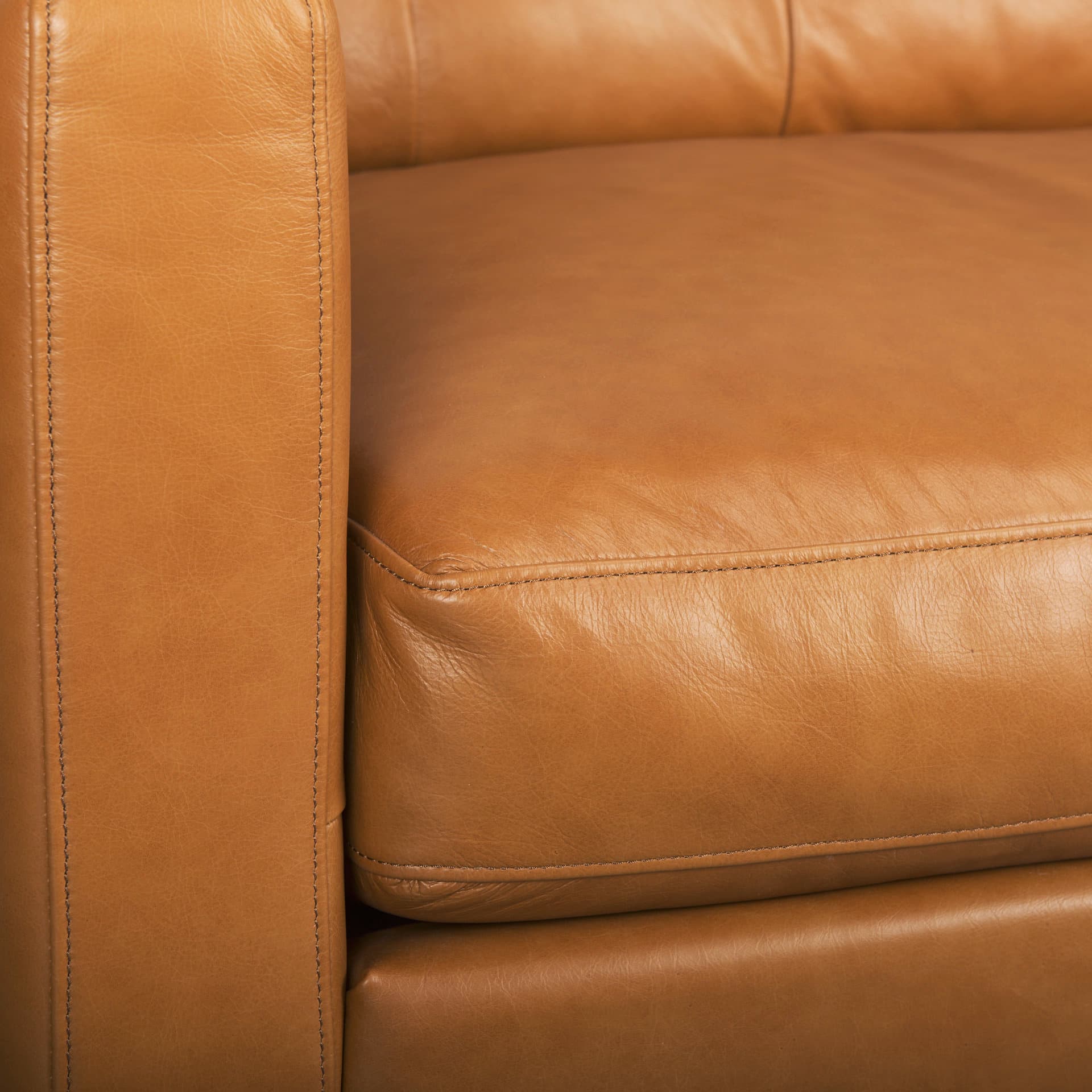 Olaf 88.2L x 37.8W x 35.0H Tan Leather Sofa — product photograph