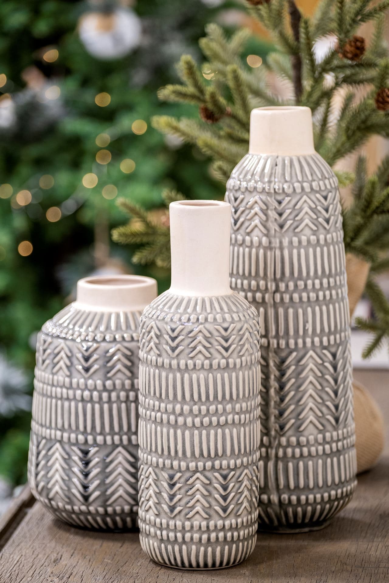 Riker III Large Dark Gray Cream Ceramic Vase — in a styled room