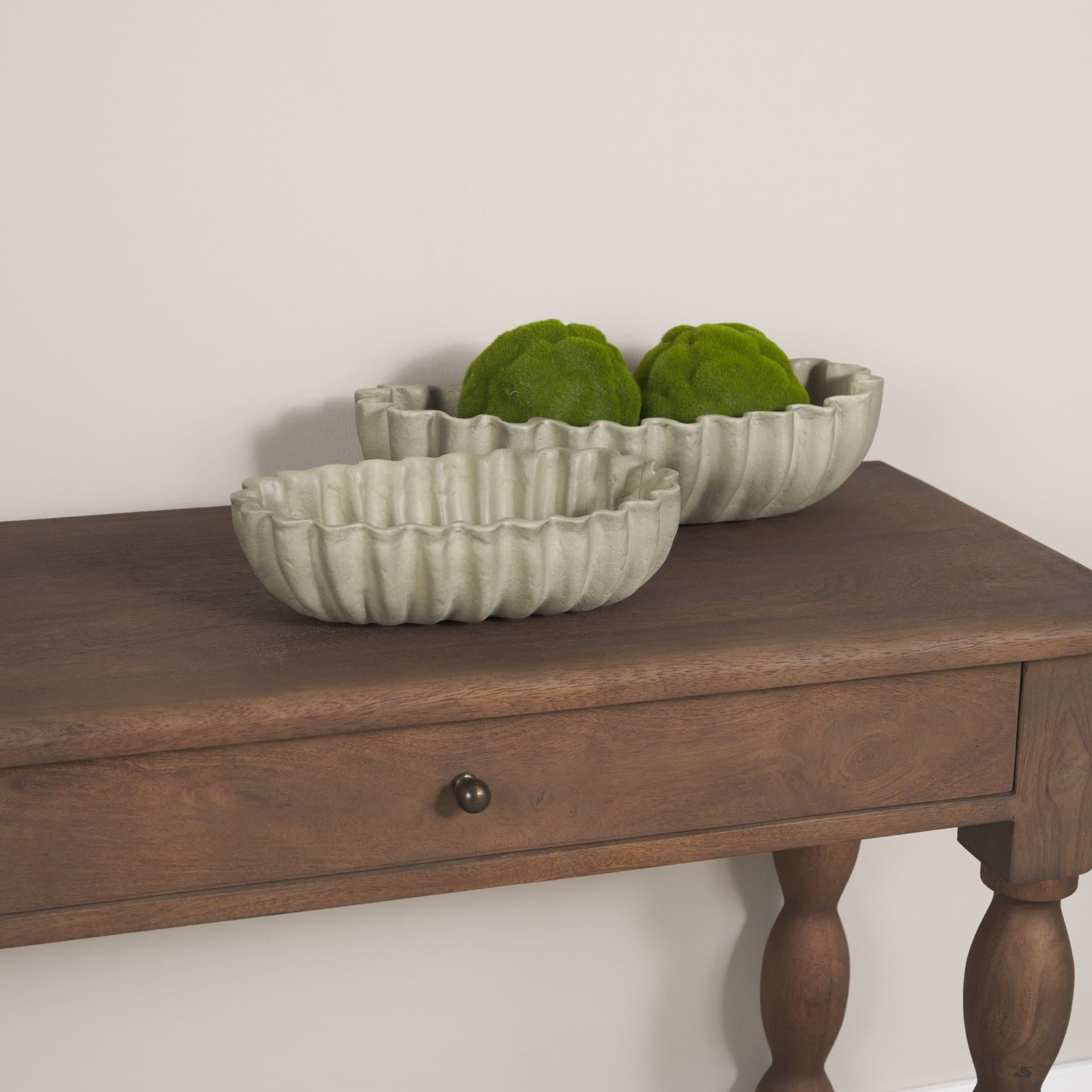 Camelia Fluted Sage Green Paper Mache Long Centerpiece Bowl — in a styled room