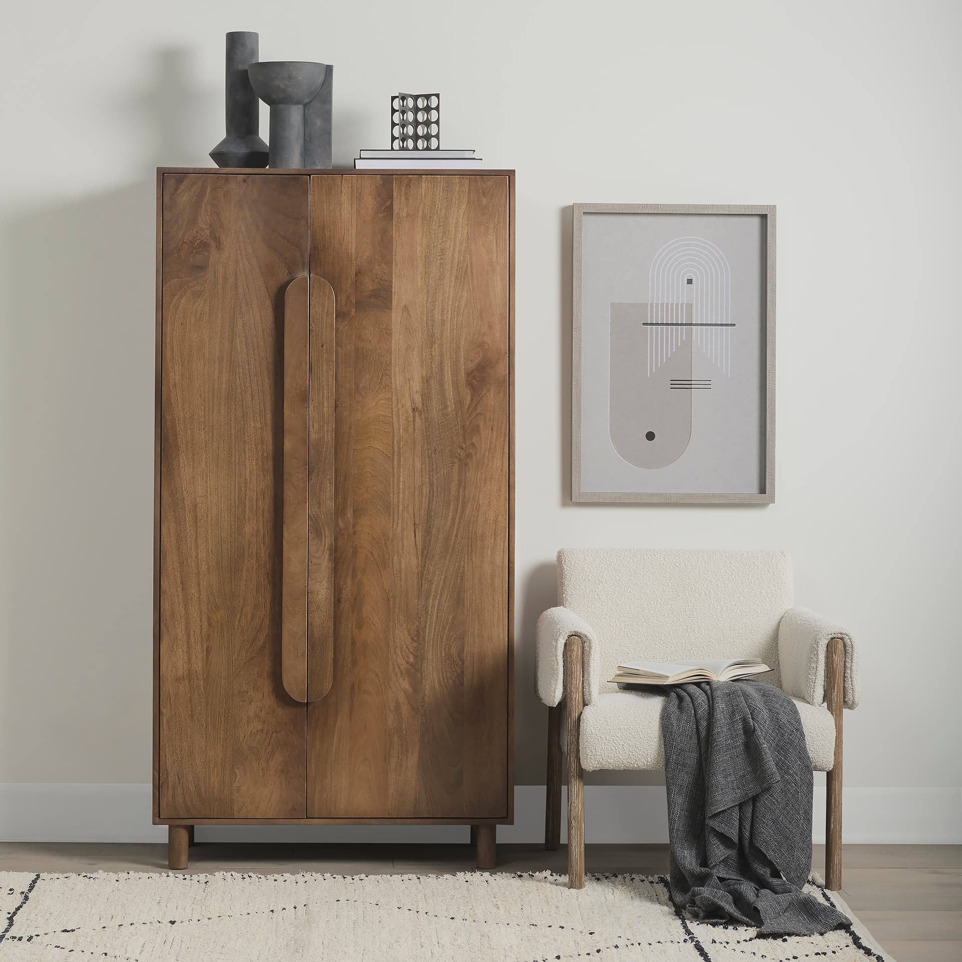 Astrid 36.0L x 17.0W x 70.0H Medium Brown Solid Wood Armoire — in a styled room