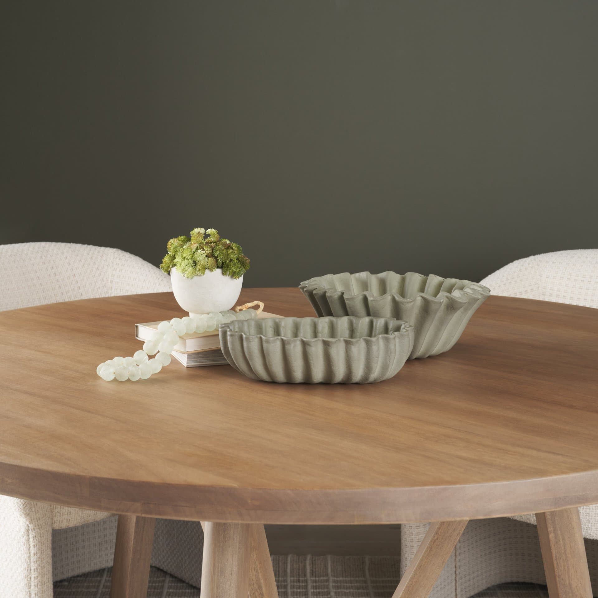 Camelia Small Fluted Sage Green Paper Mache Round Centerpiece Bowl — in a styled room