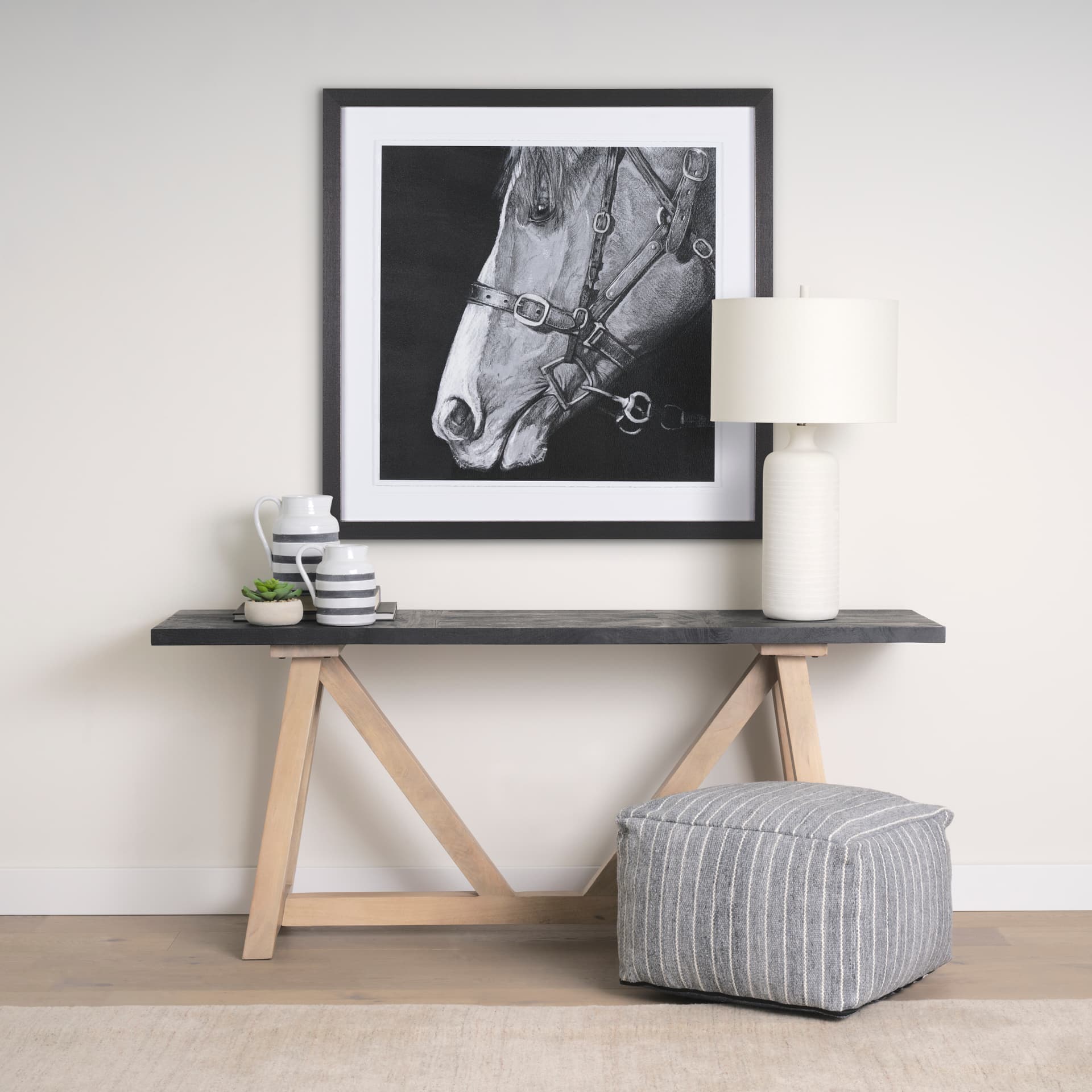 Rialto Two-Toned Black and Brown Wood Angular Leg Console Table — in a styled room