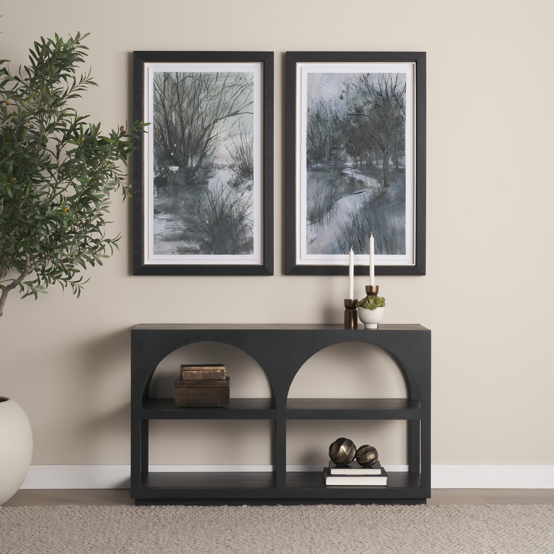 Bela 54" Matte Black Wood Arched Console Table — in a styled room