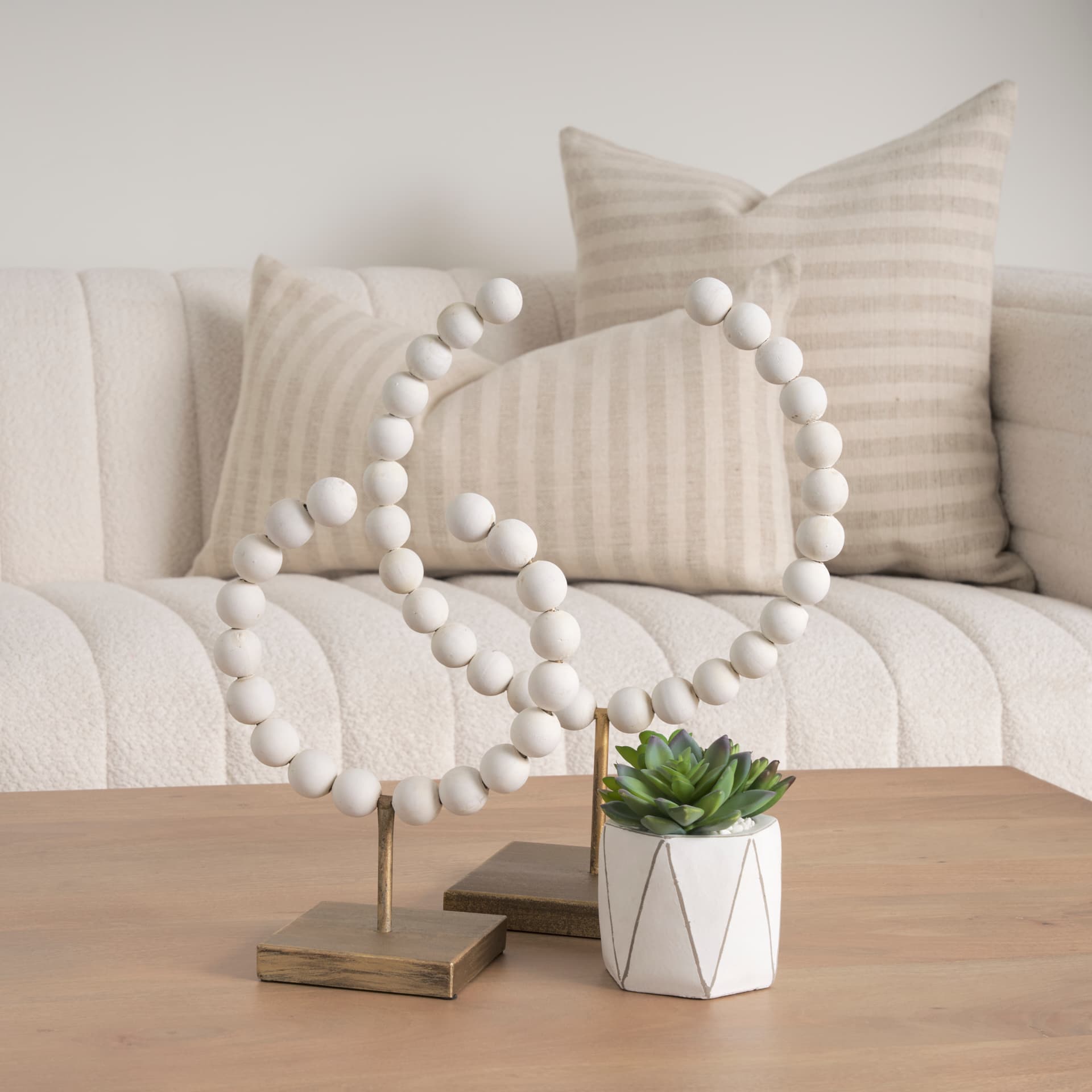 Pontchartrain II (Large) 11L x 6W White Beaded Broken Sphere Decorative Object W/ Gold Base — in a styled room