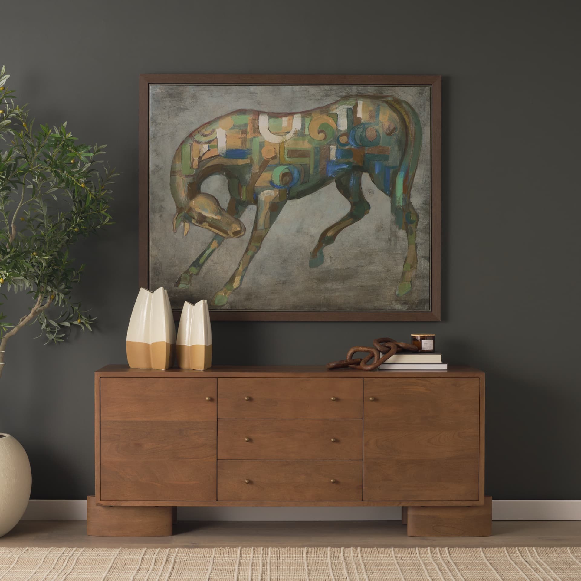 Jonan Medium Brown Wood w/ Dark Aged Brass 2 Door 3 Drawer Sideboard — in a styled room