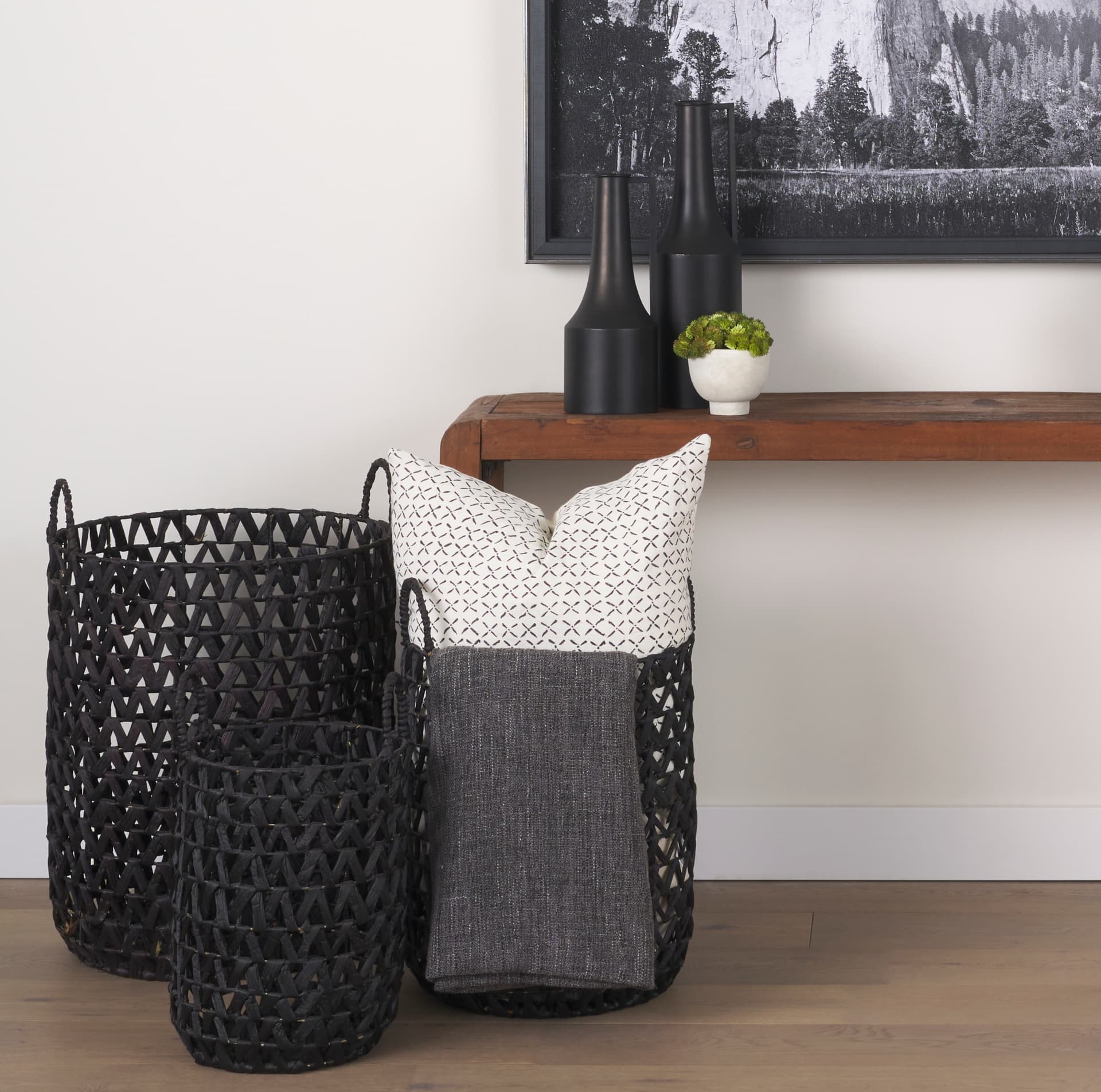 Lola (Set of 3) Black Water Hyacinth Zig Zag Weave Round Basket W/ Handles — in a styled room