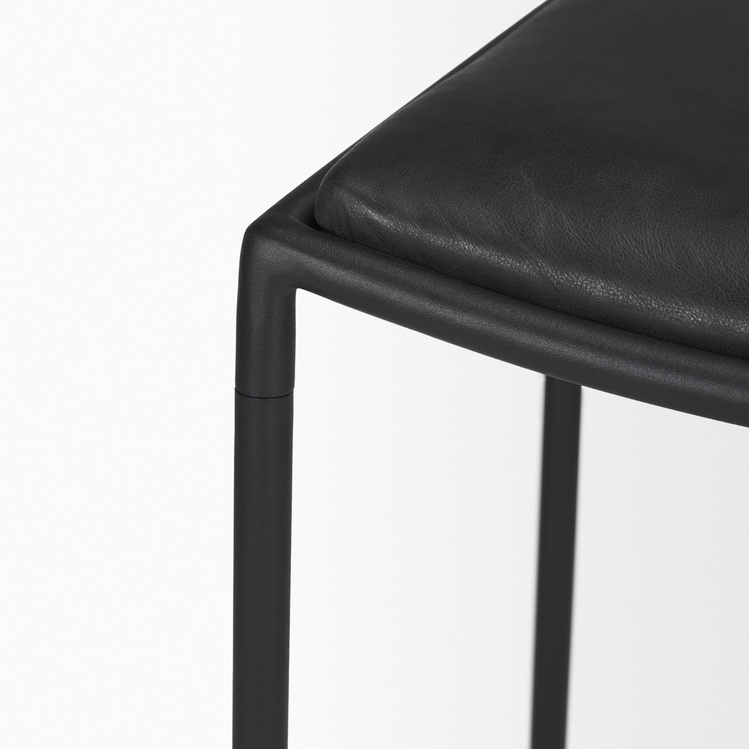 Taniel Backless 27.25in Seat Counter Stool | Black Leather w/ Metal — product photograph