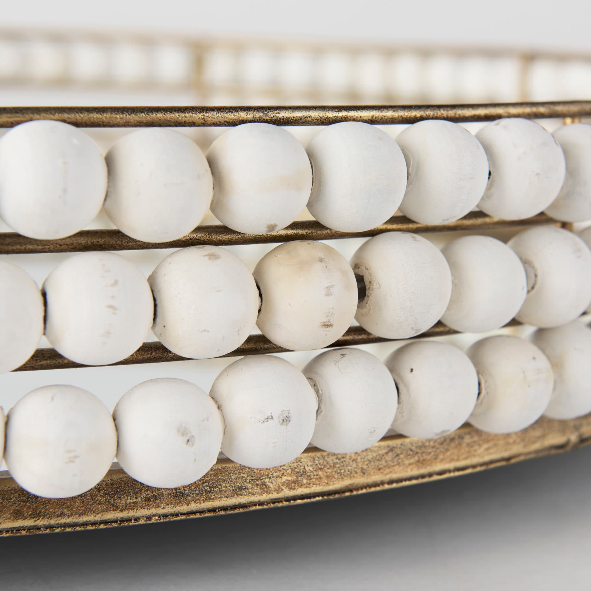 Decatur I 21L x 21W White Wooden Bead Mirrored Bottom Round Tray — product photograph