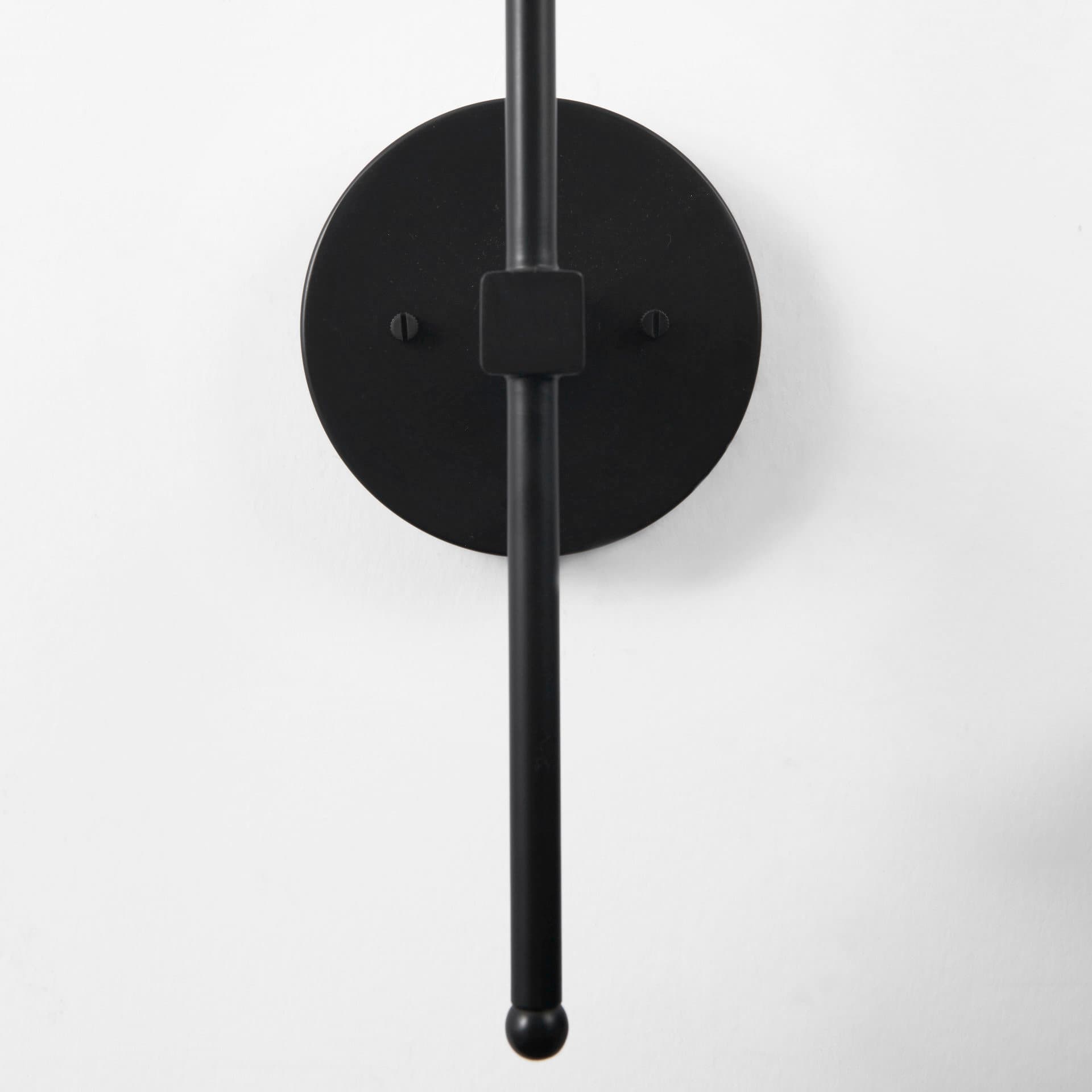 Clyde 6.0L x 8.0W x 37.0H Matte Black W/Glass Round Wall Sconce — product photograph