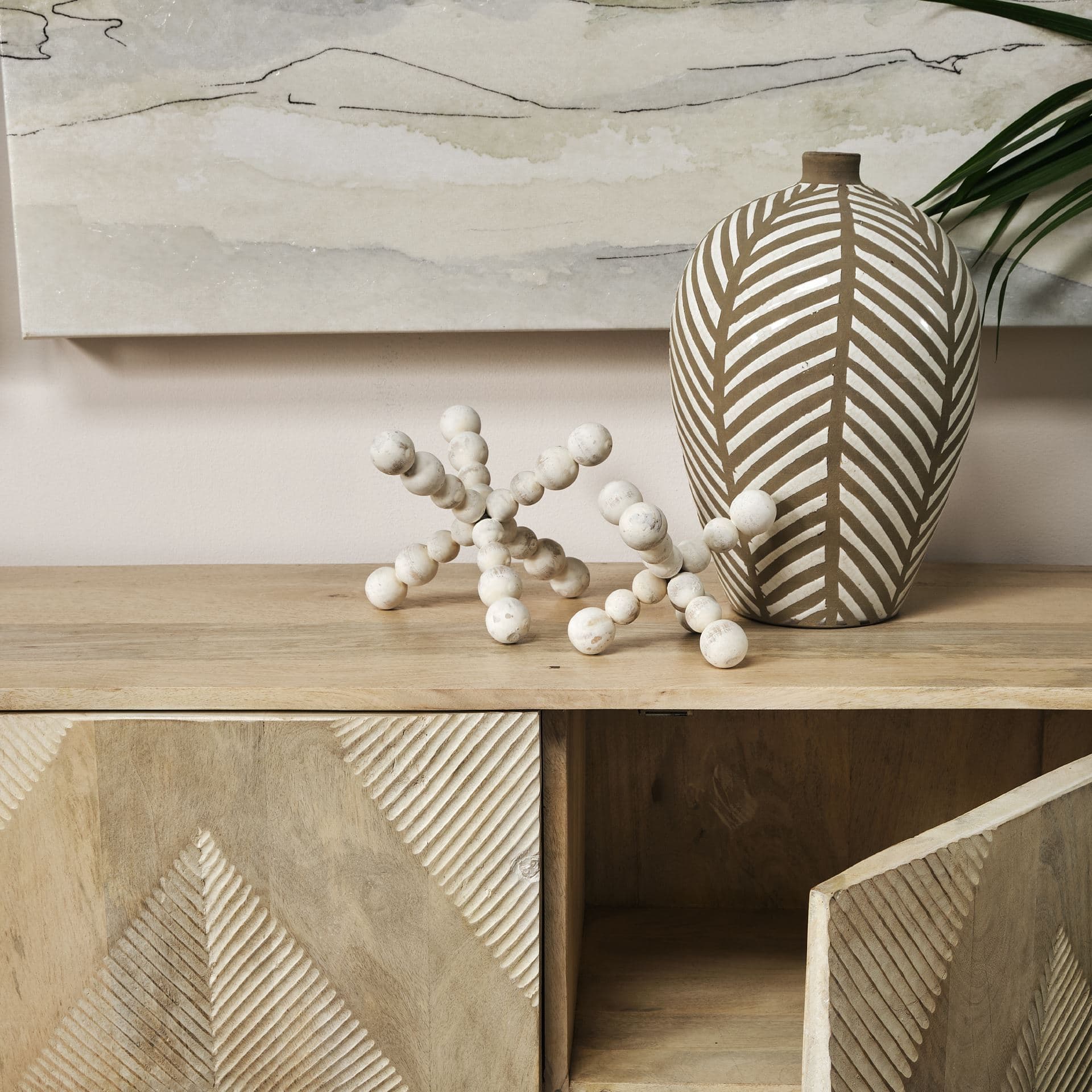 Carrollton II (Large) 9L x 9W Off-White Geometric Wood Ball Jack — in a styled room