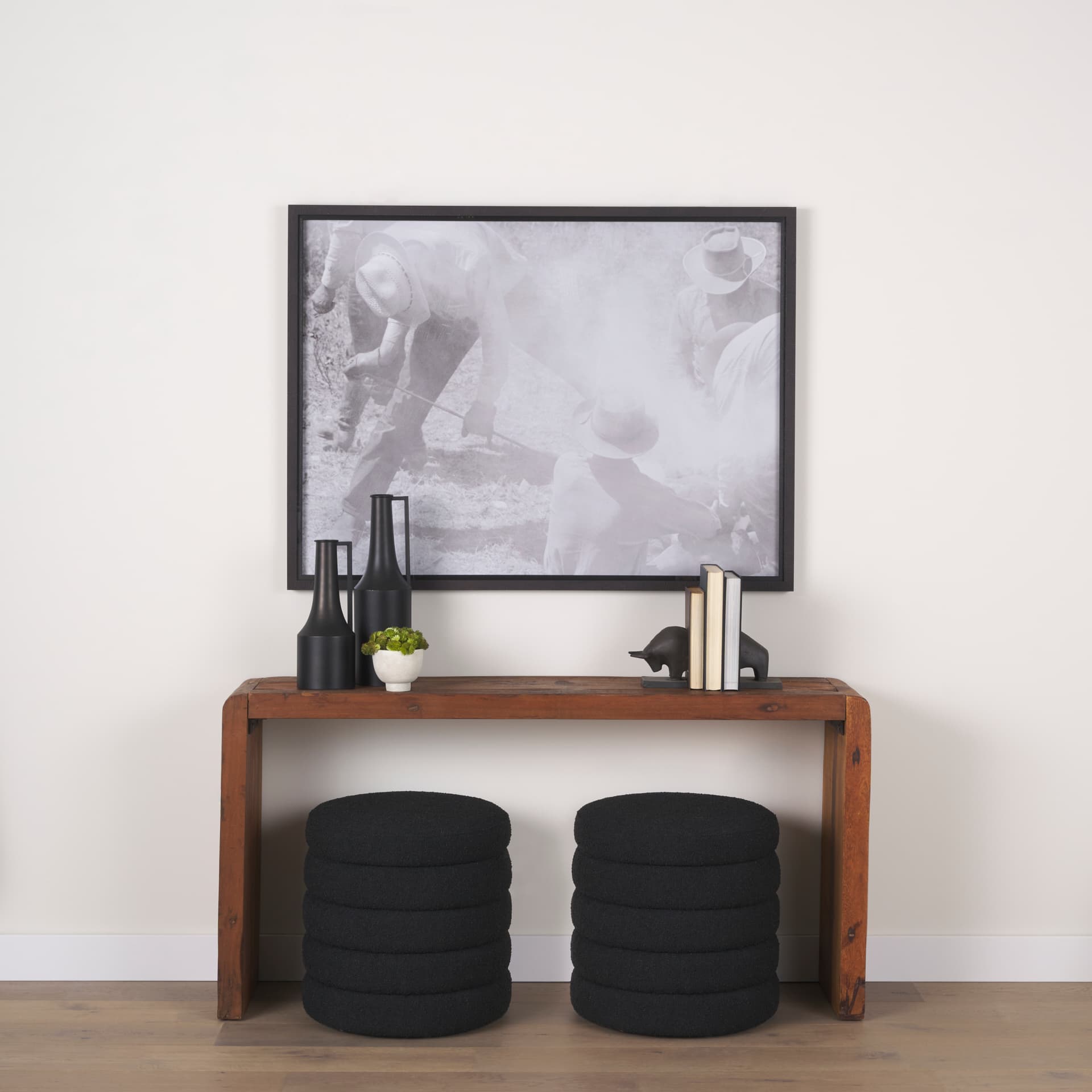 Tauro III (Set of 2) 10L x 5W Black Cast Aluminum Raging Bull Bookends — in a styled room