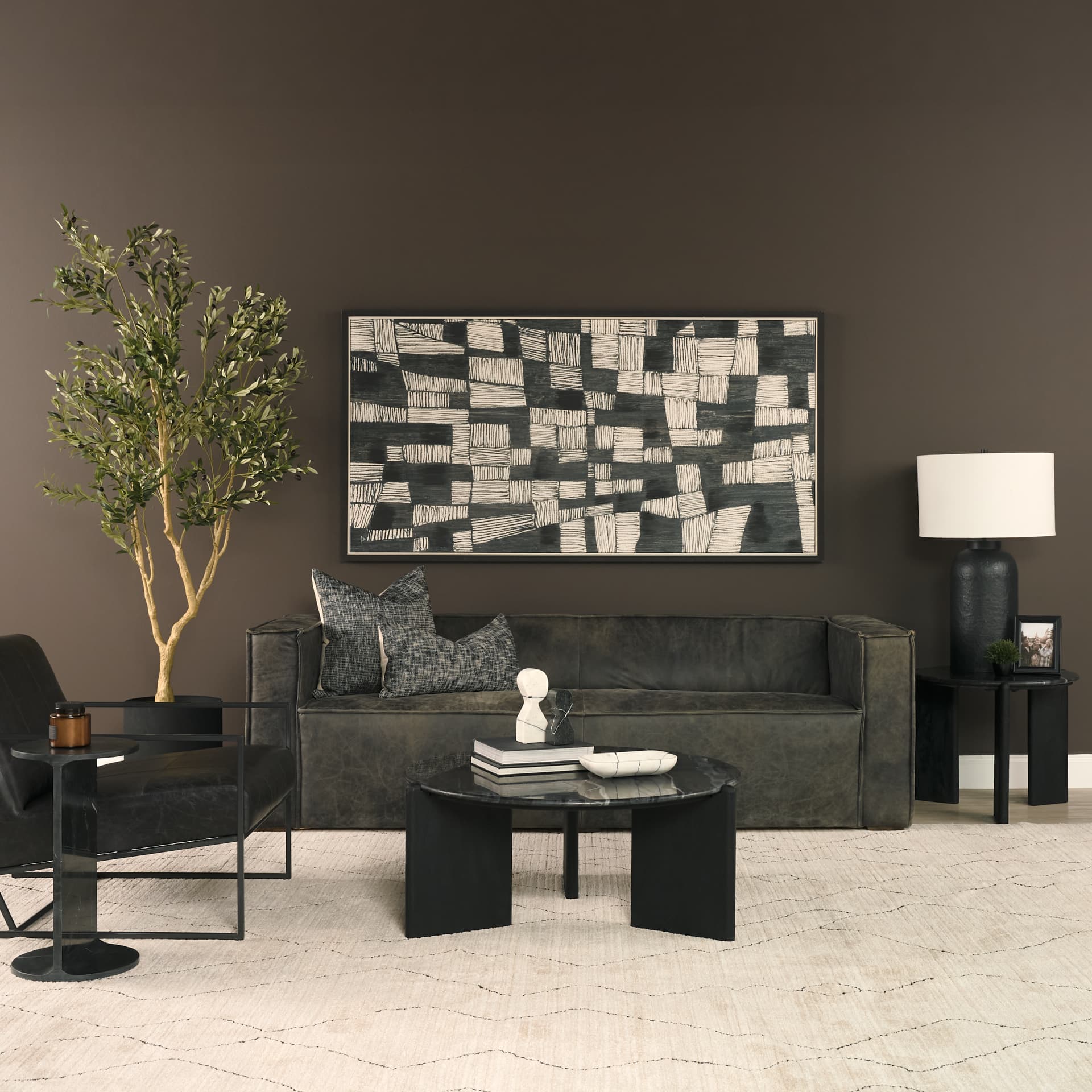 Rumer Black Wood w/ Black Marble Coffee Table — in a styled room