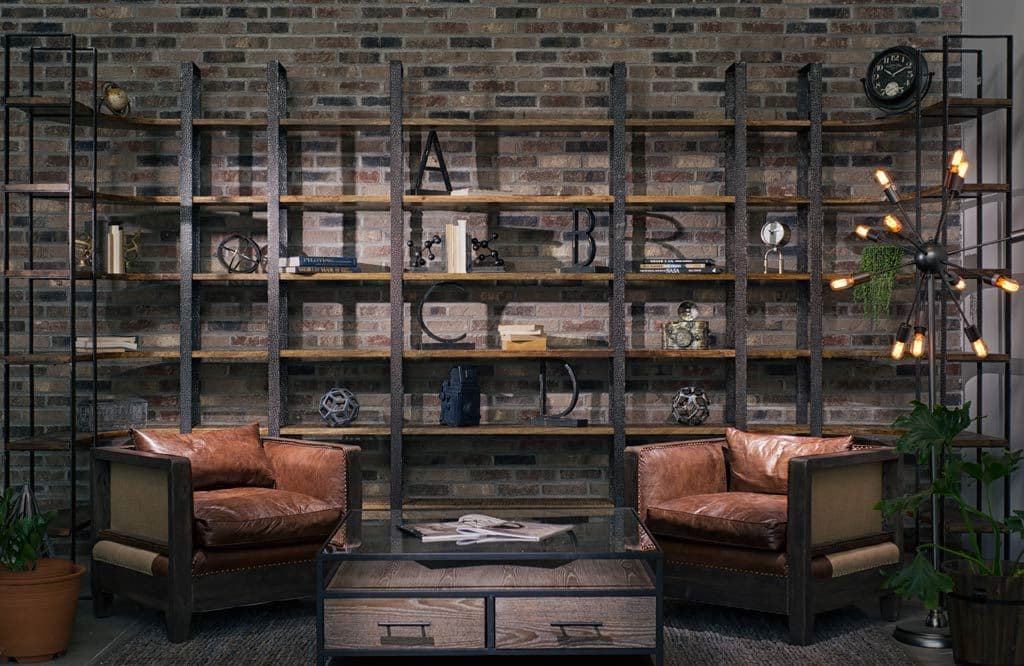 Turner I 37L x 10.5W x 90H Curved Brown Wood and Black Iron Six Shelving Unit — in a styled room