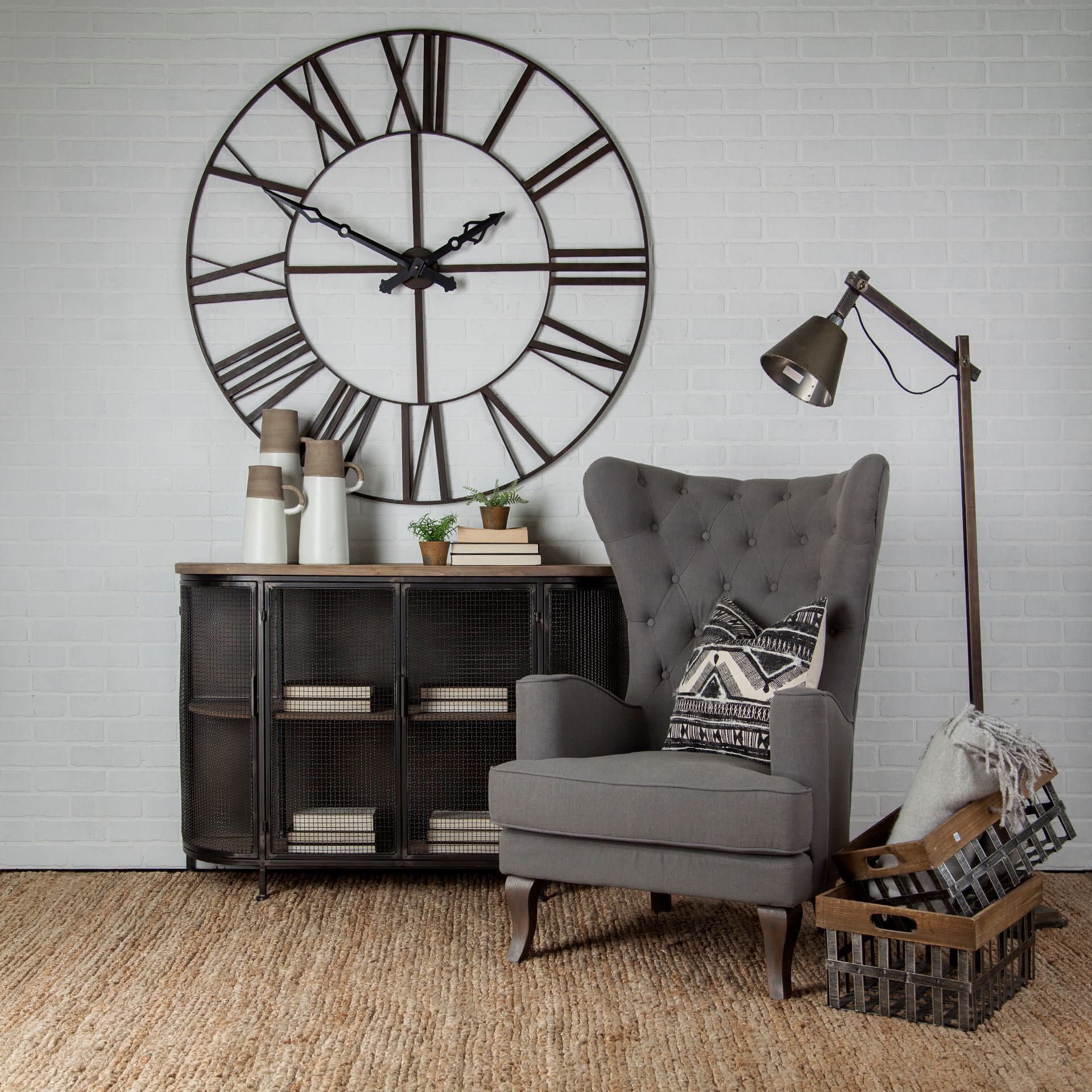Pender 50" Round Giant Oversized Industrial Wall Clock — in a styled room