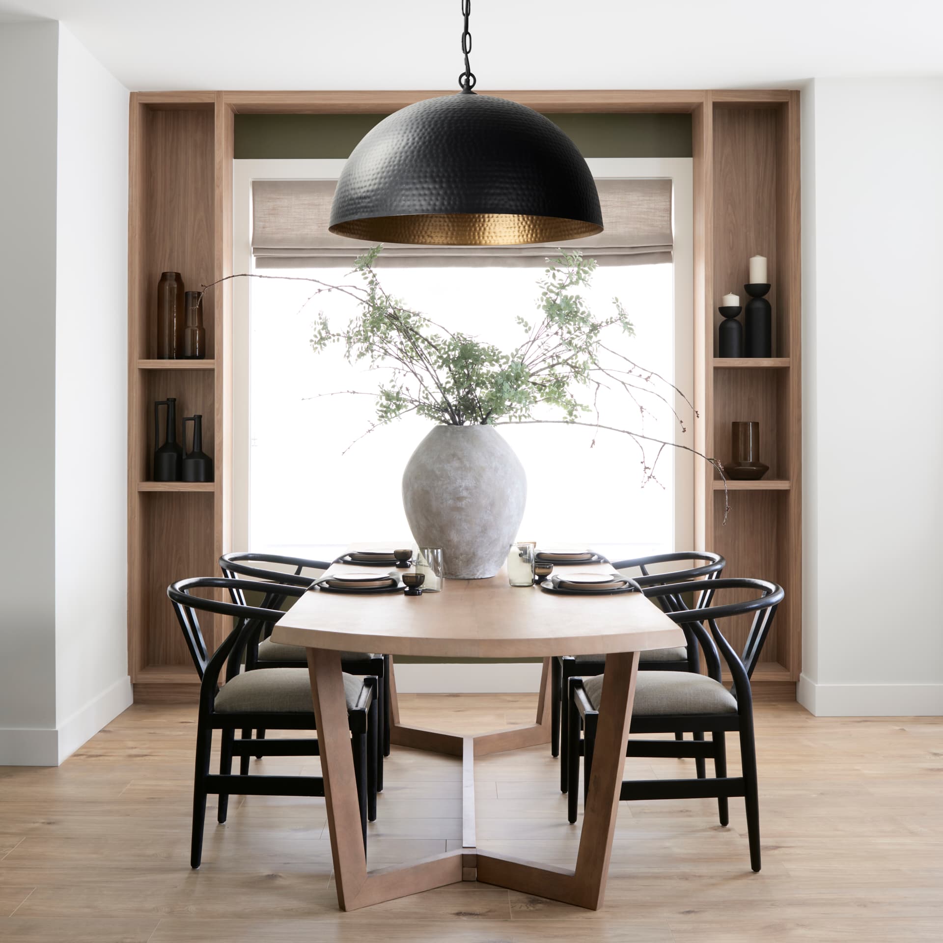Karina 36" Round Matte Black Hammered Metal Dome Pendant Light — in a styled room