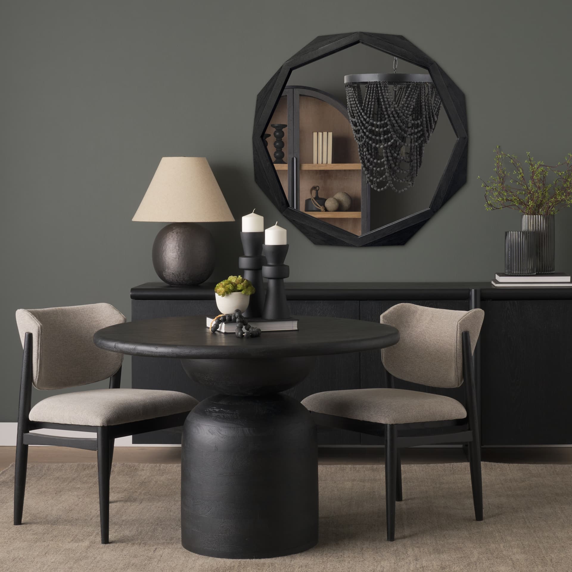 Aramis II 41L x 41H Octagon Black Wood Frame Wall Mirror — in a styled room