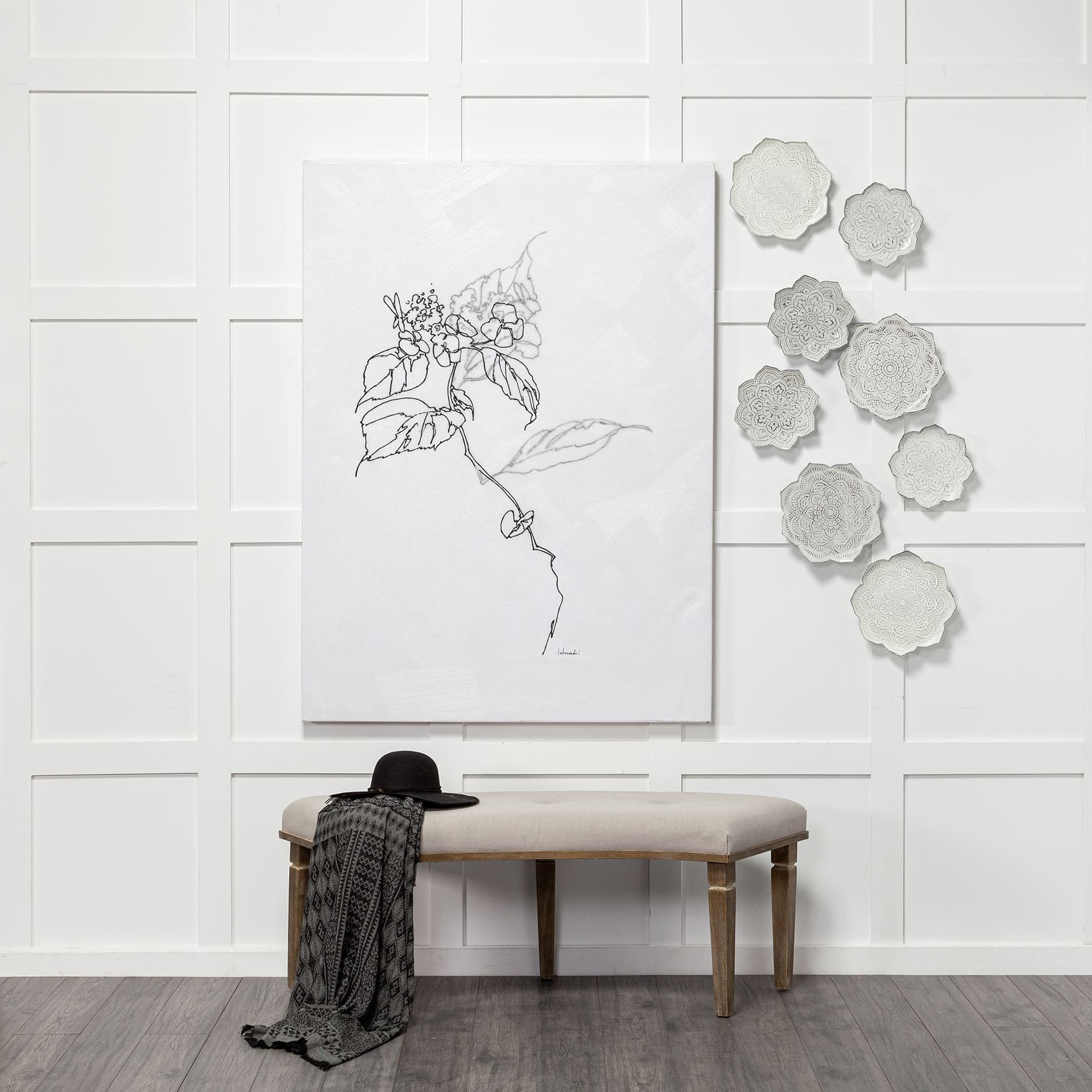 Miranda Set of 2 Stamped Metal Lotus Flower Wall Decor — in a styled room