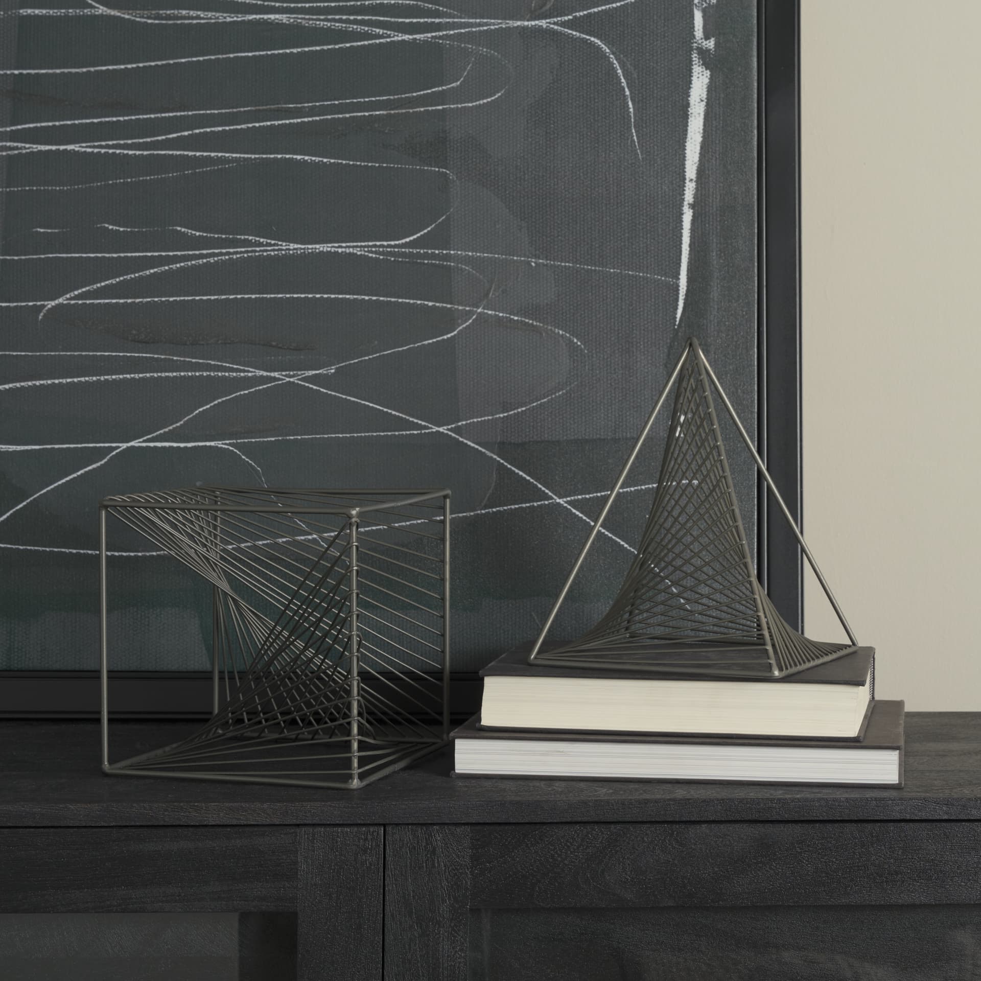 Rochon 8L x 8W Gray Metal Decorative Cube — in a styled room