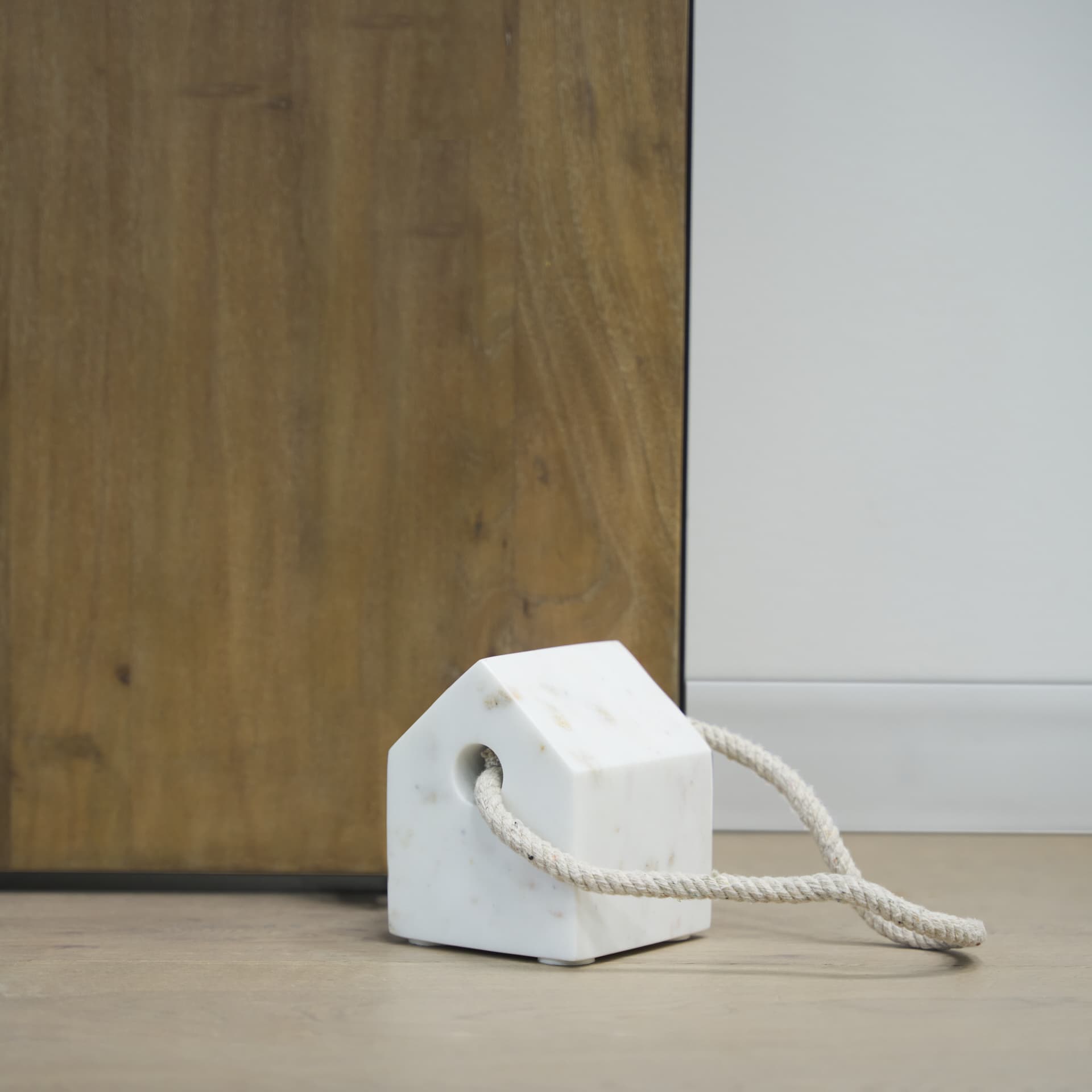 Raena White Marble House Door Stopper — product photograph