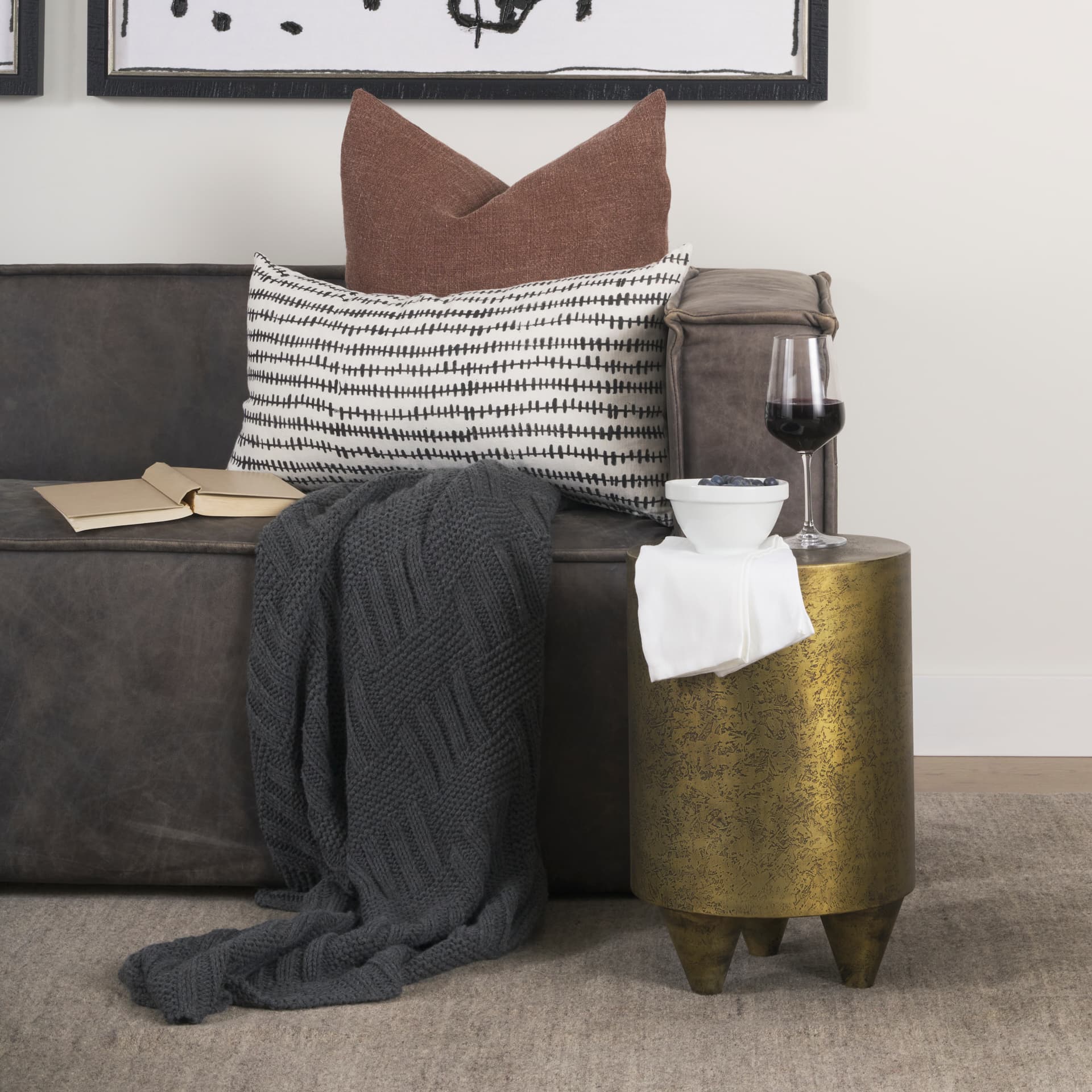 Rosh Textured Gold Metal w/ Acid Wash Accent Table — in a styled room