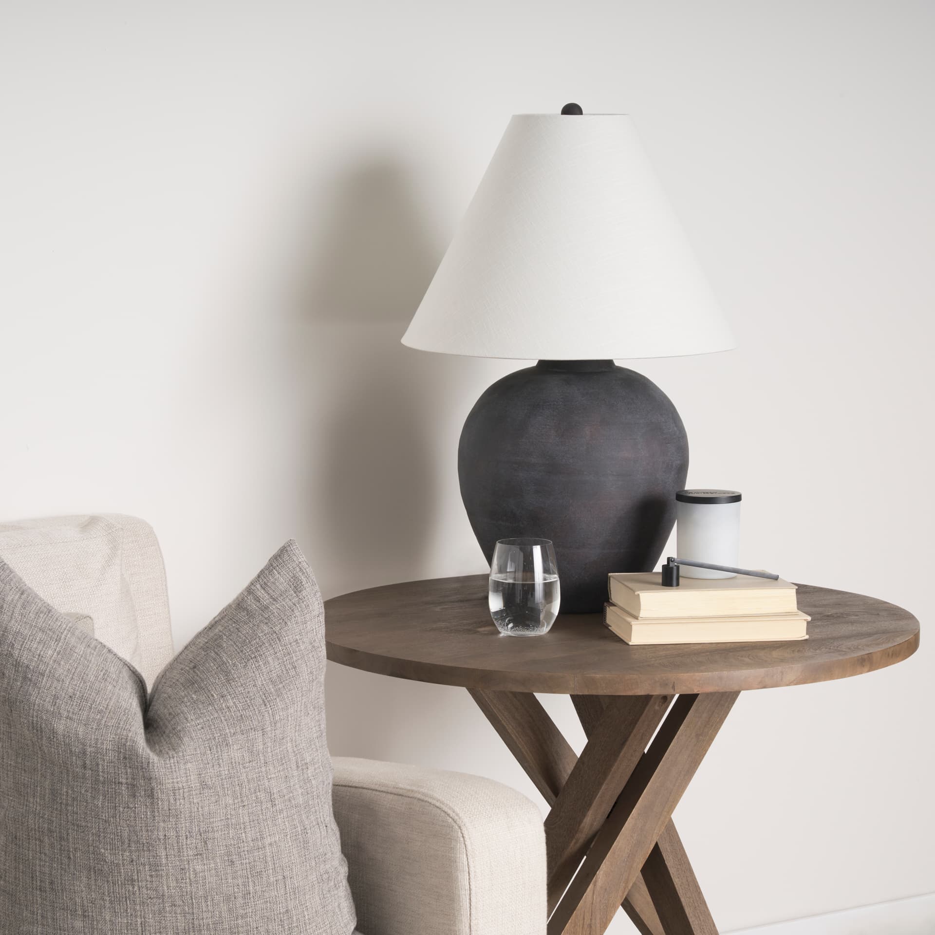 Marvin Black Ceramic Table Lamp — in a styled room