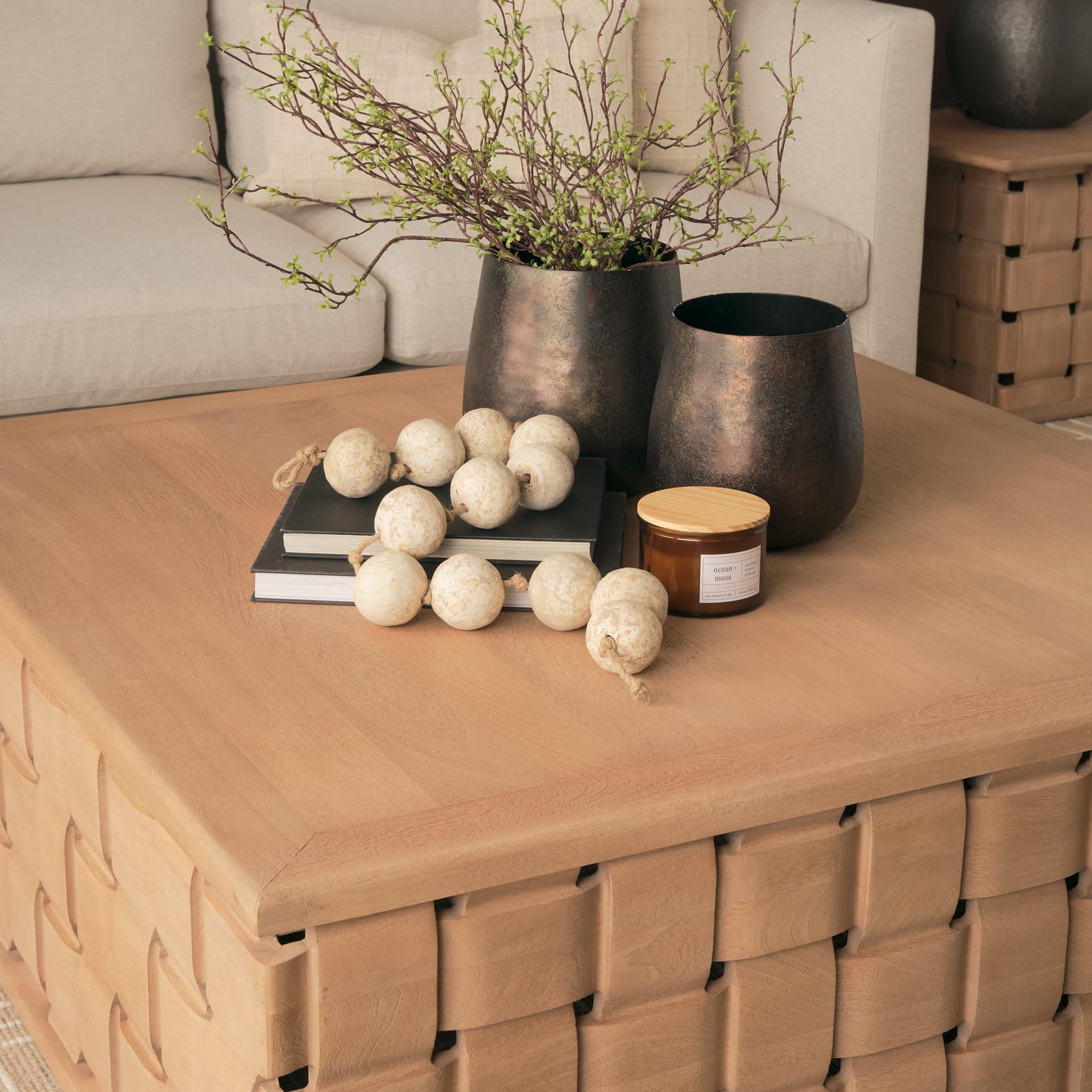 Trellyn 48" Light Brown Wood w/ Carved Woven Base Square Coffee Table — product photograph