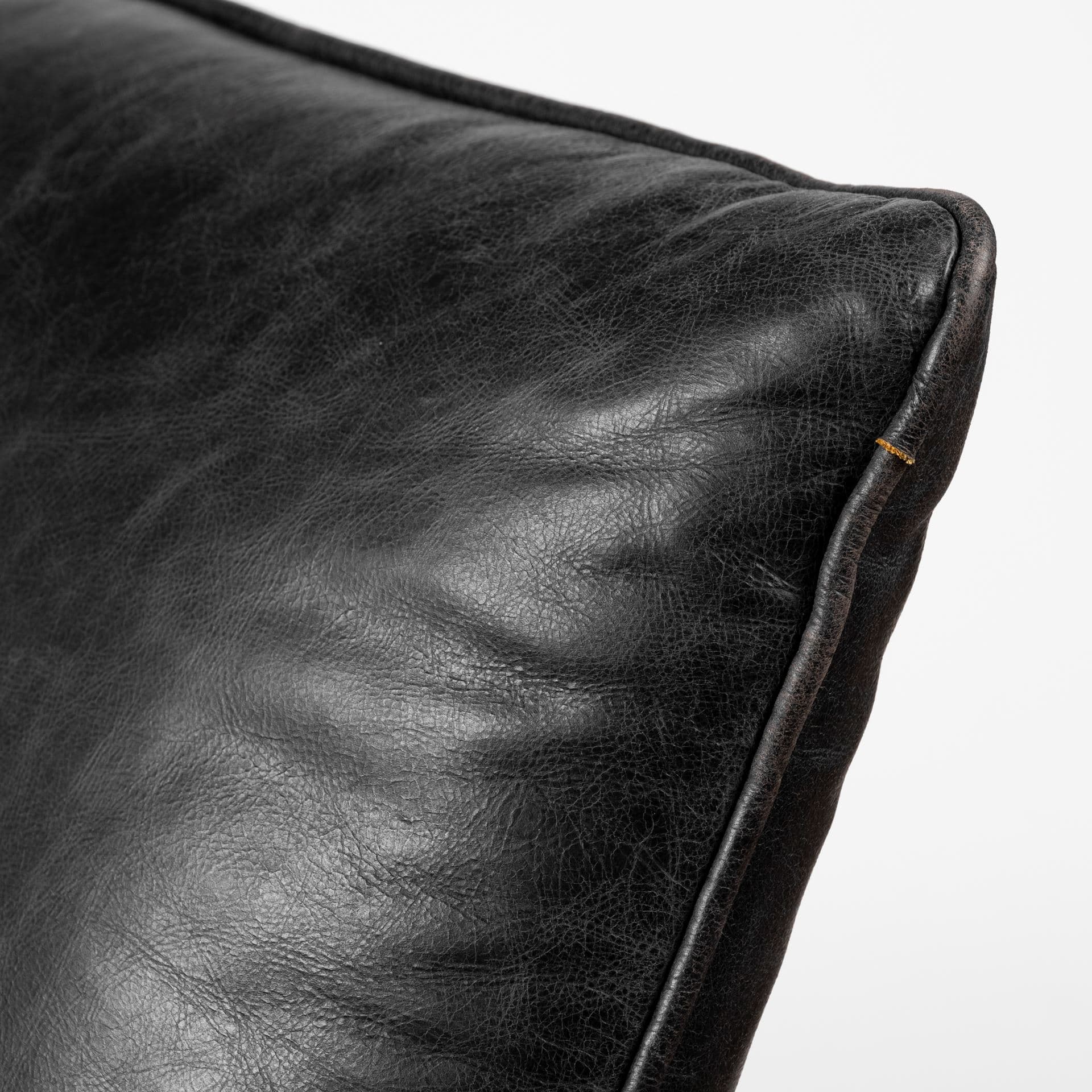Flavelle II Black Leather Cushion Seat and Solid Iron Base Accent Chair — product photograph