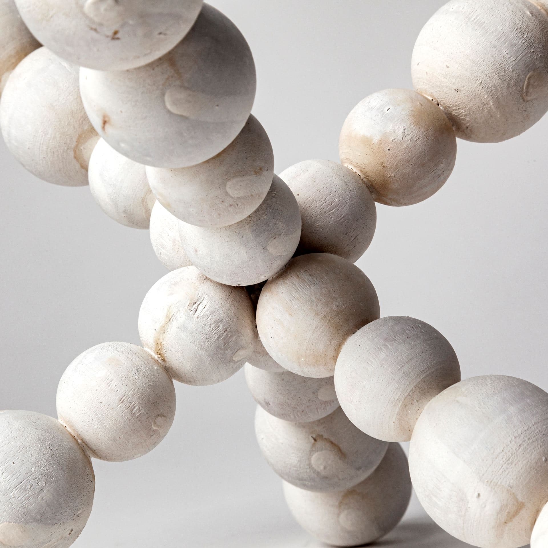 Carrollton II (Large) 9L x 9W Off-White Geometric Wood Ball Jack — product photograph