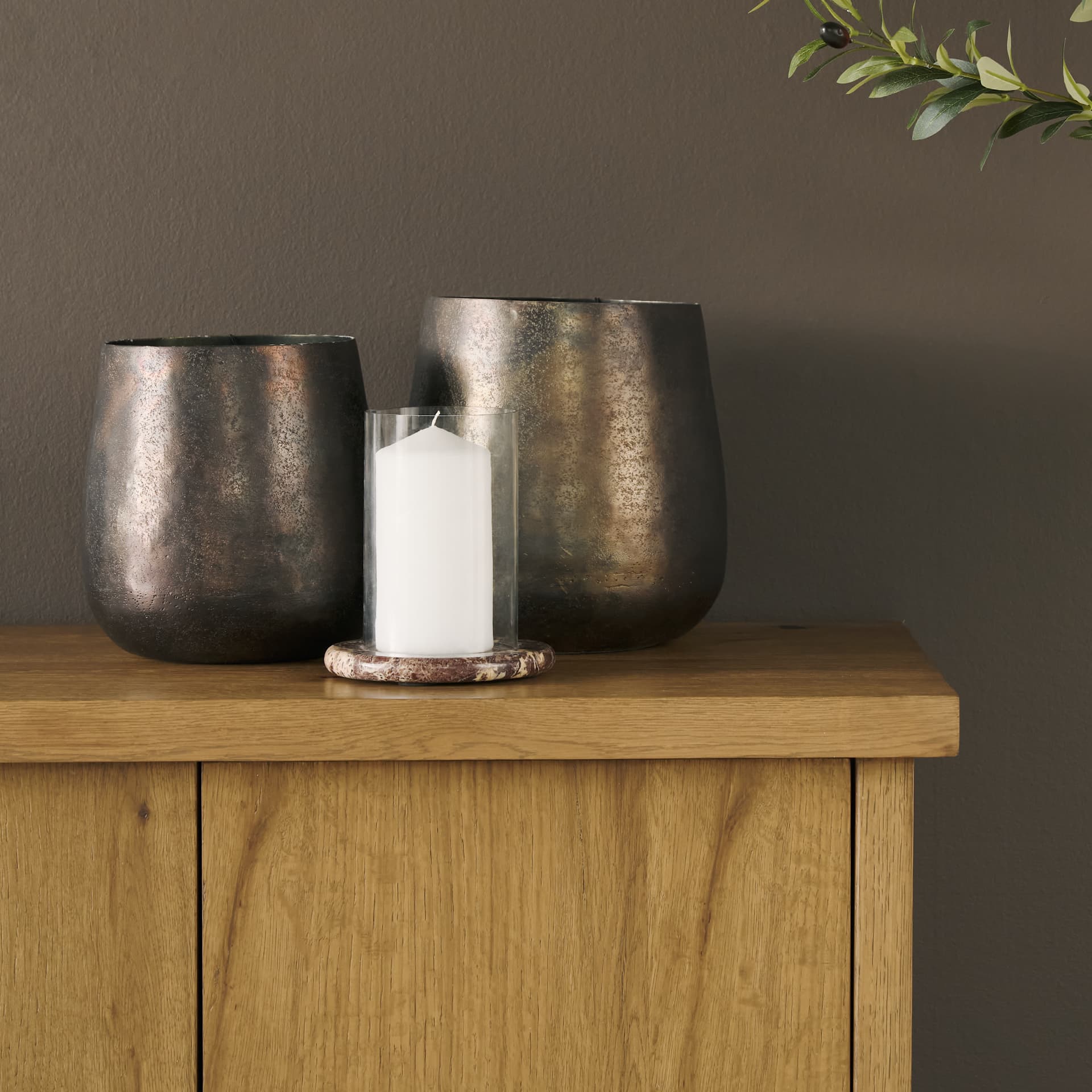 Bordo Red Marble w/ Glass Hurricane Candle Holder — in a styled room