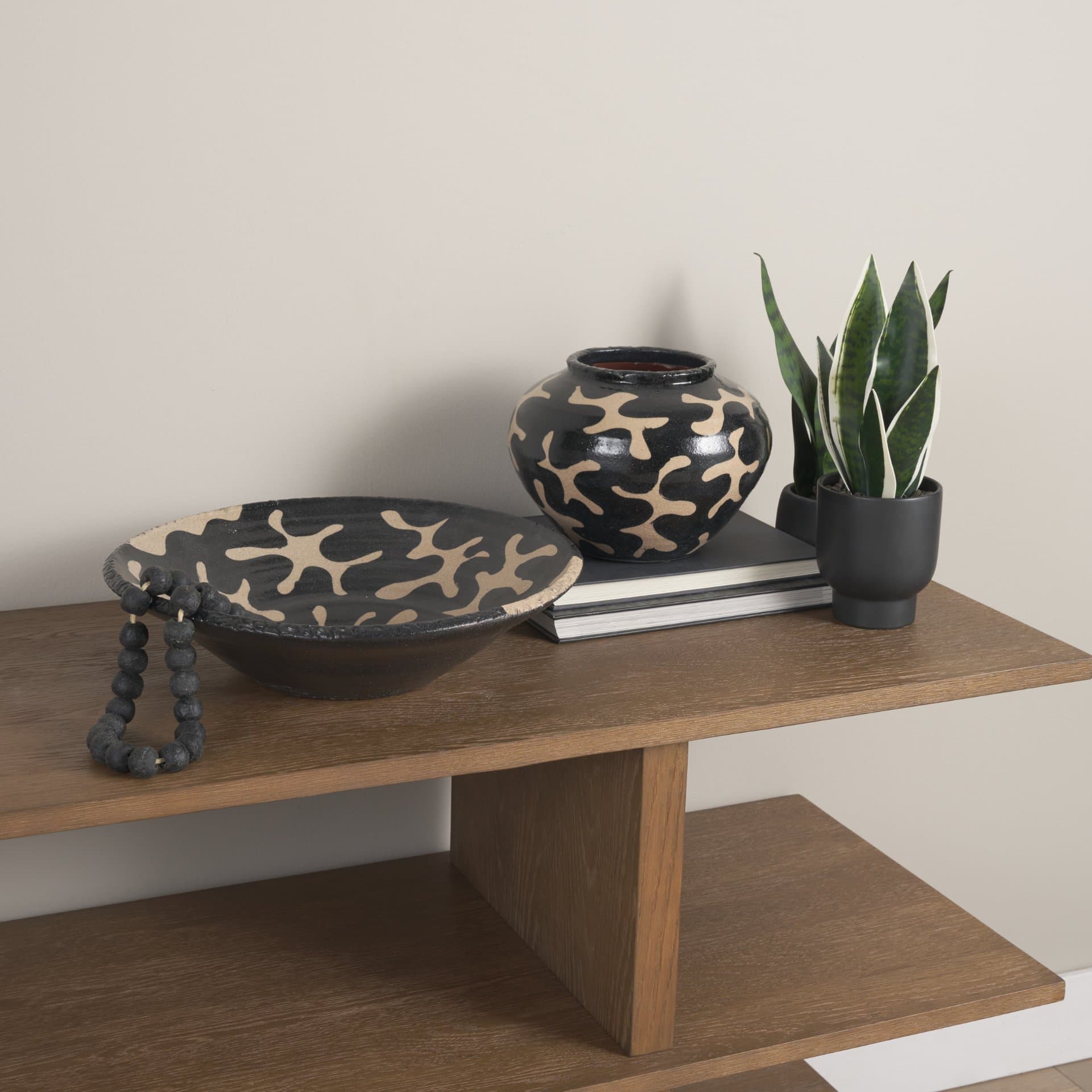 Bosma Black and Cream Ceramic Decorative Bowl — in a styled room