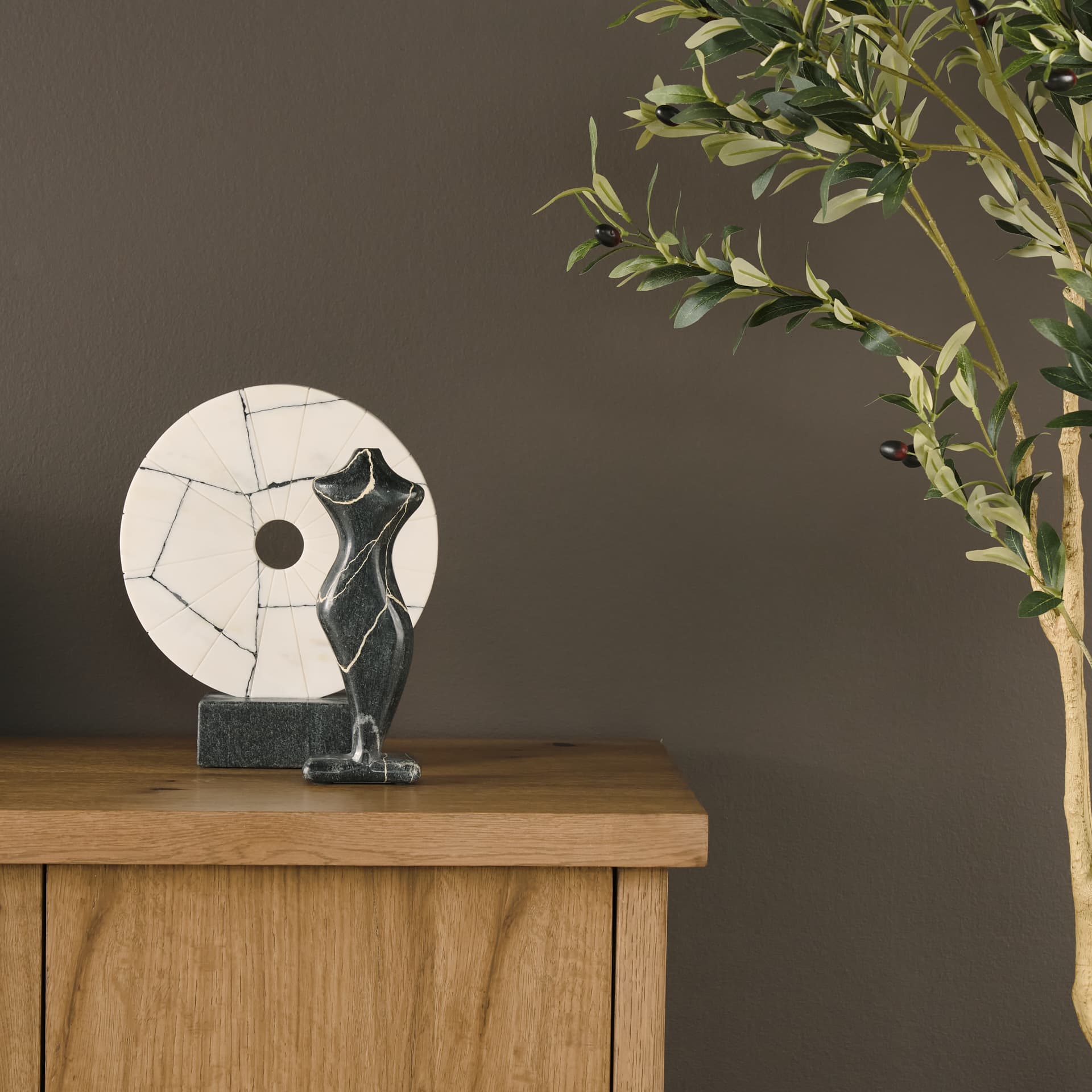 Contour Black Marble Silhouette Decorative Object — in a styled room