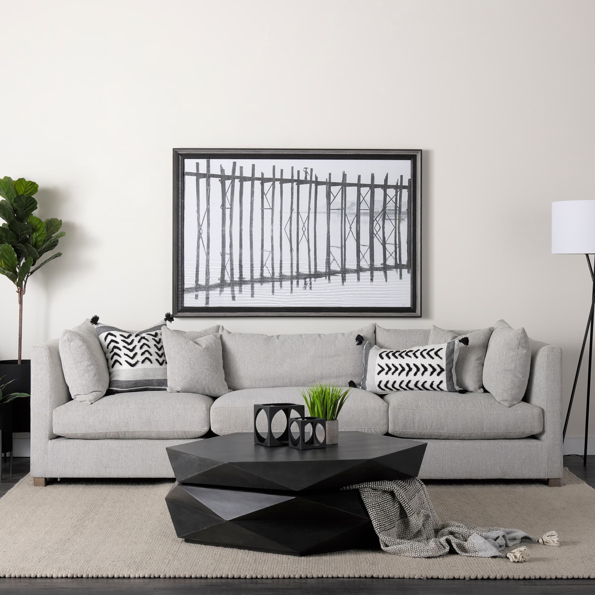 Arreto 48" Black Solid Wood Hexagonal Storage Coffee Table — in a styled room