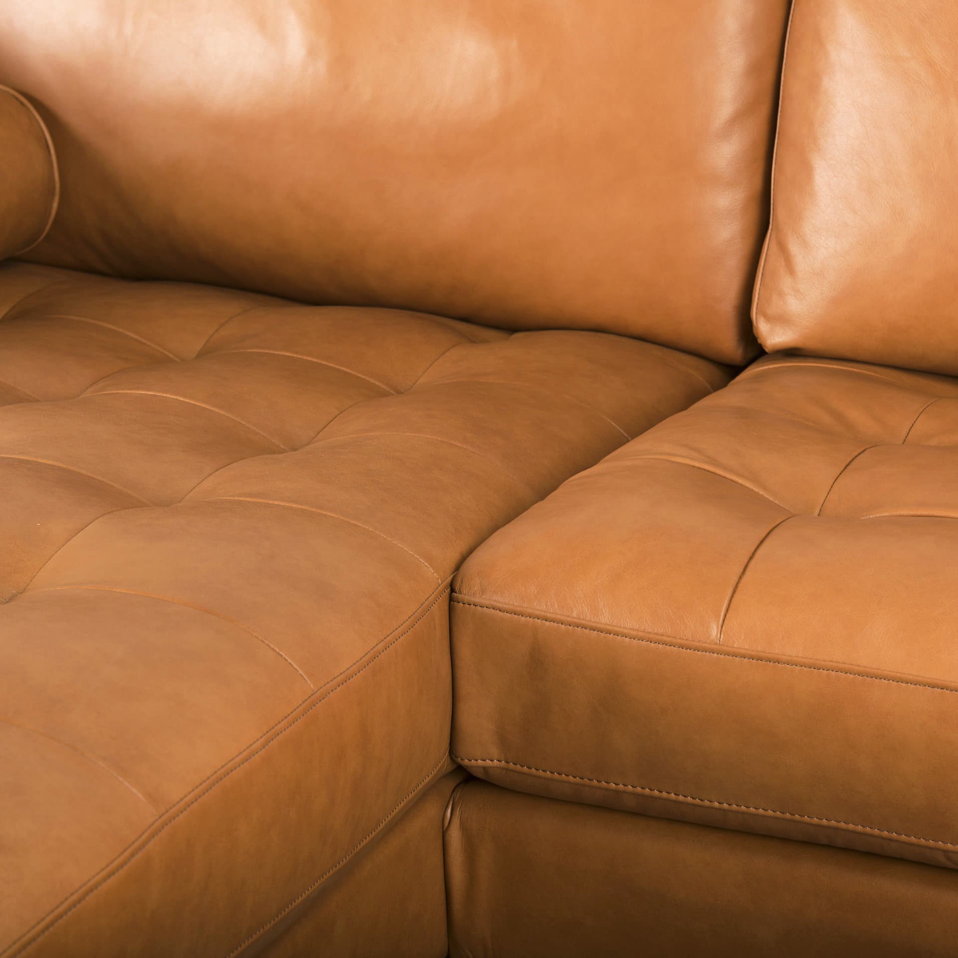 Svend 111.4L x 68.0W x 33.9H Tan Leather Left Chaise Sectional Sofa — product photograph