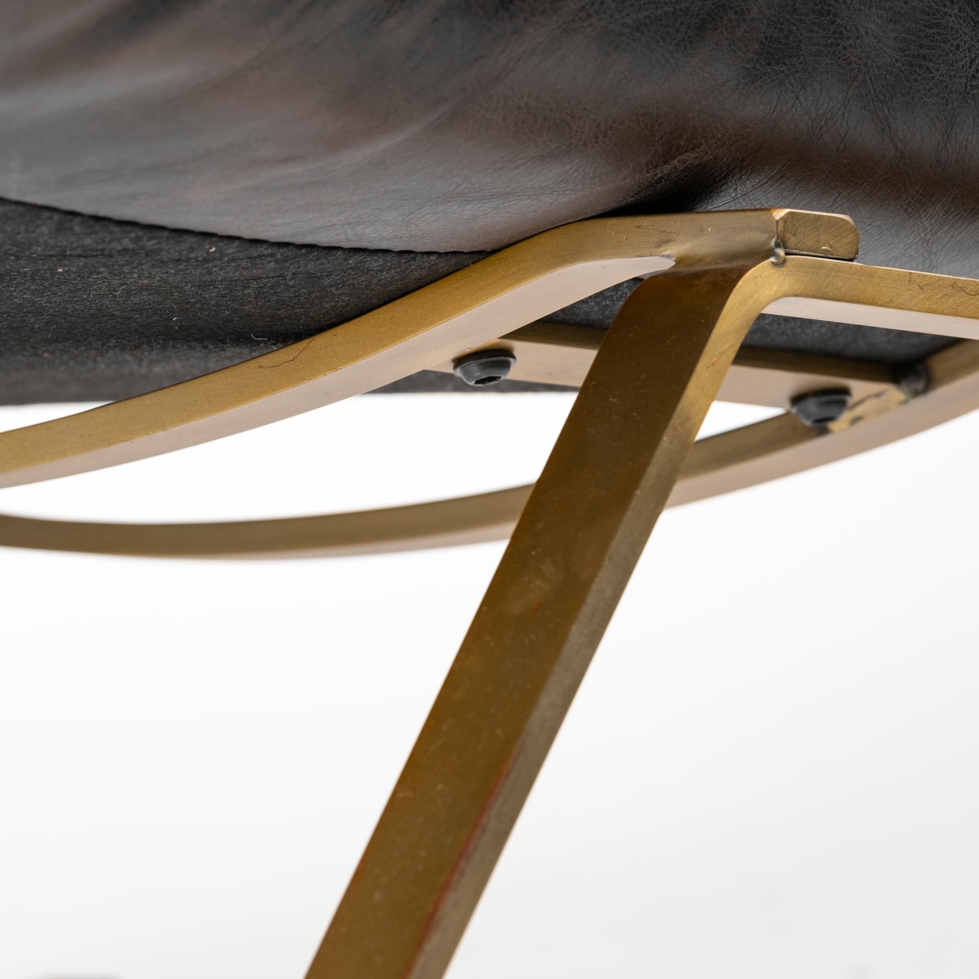 Flavelle II Black Leather Cushion Seat and Solid Iron Base Accent Chair — product photograph