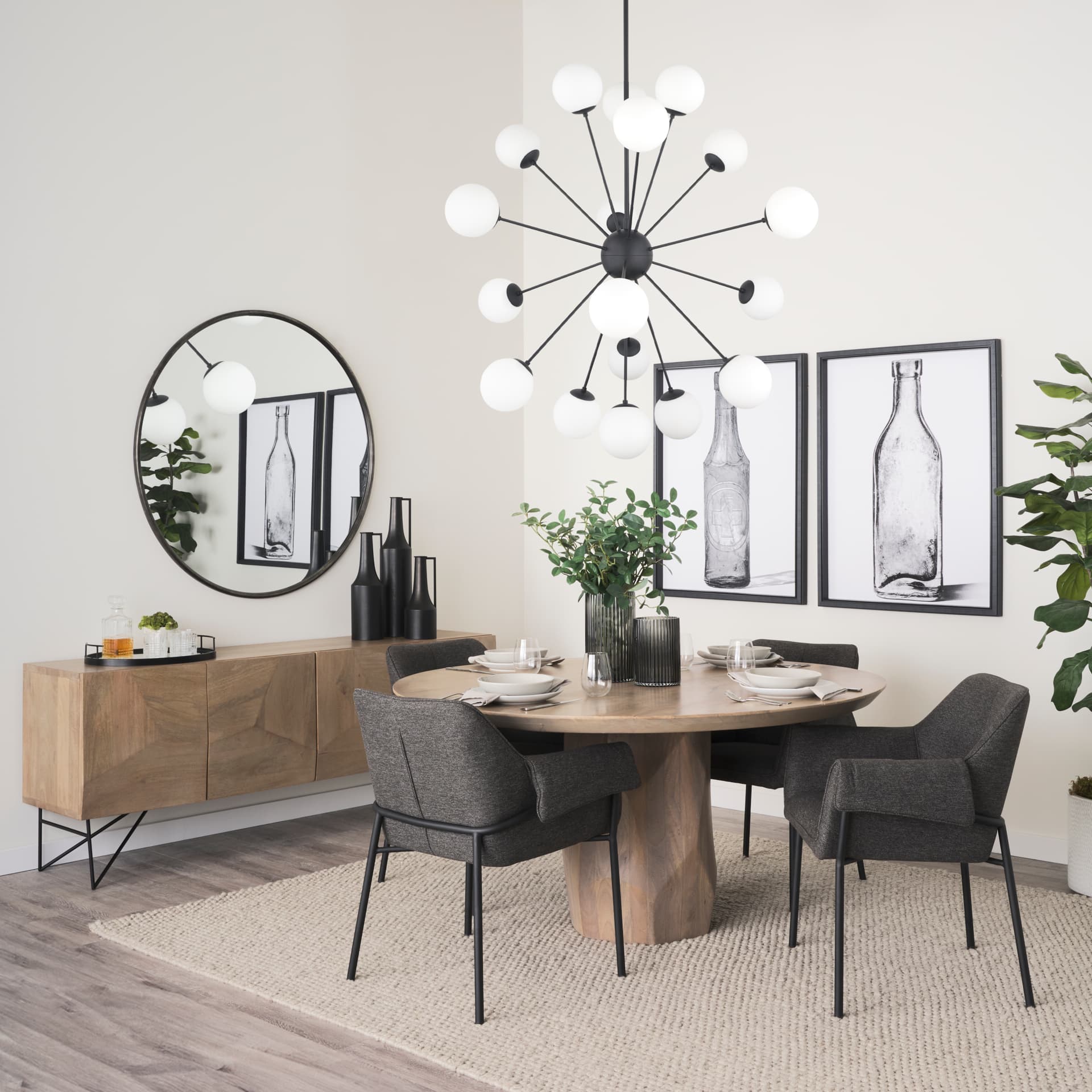 Barbara Matte Black Metal w/ Frosted Glass Globes 18-Light Chandelier — in a styled room