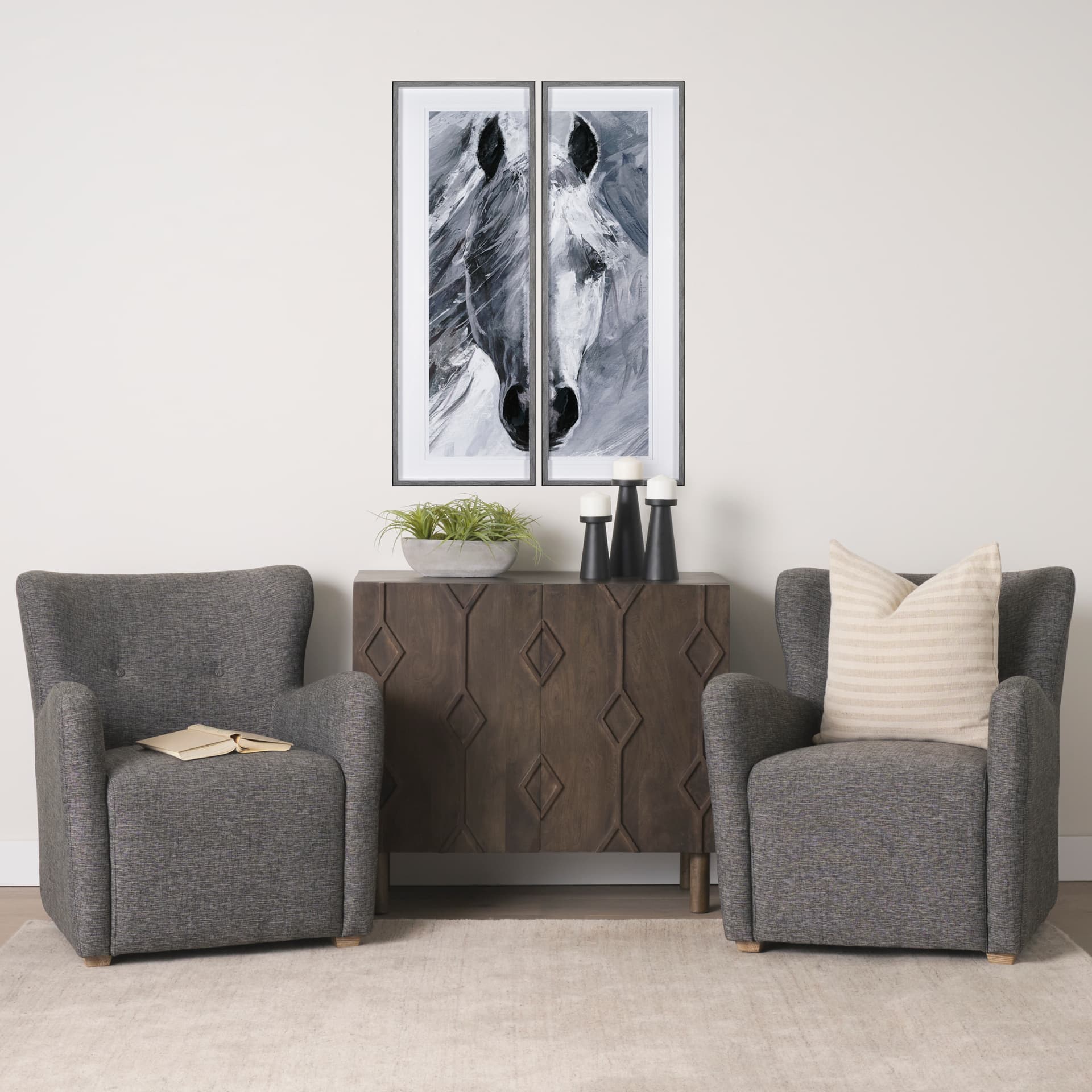 Quadir Medium Matte Black Metal Candle Holder — in a styled room