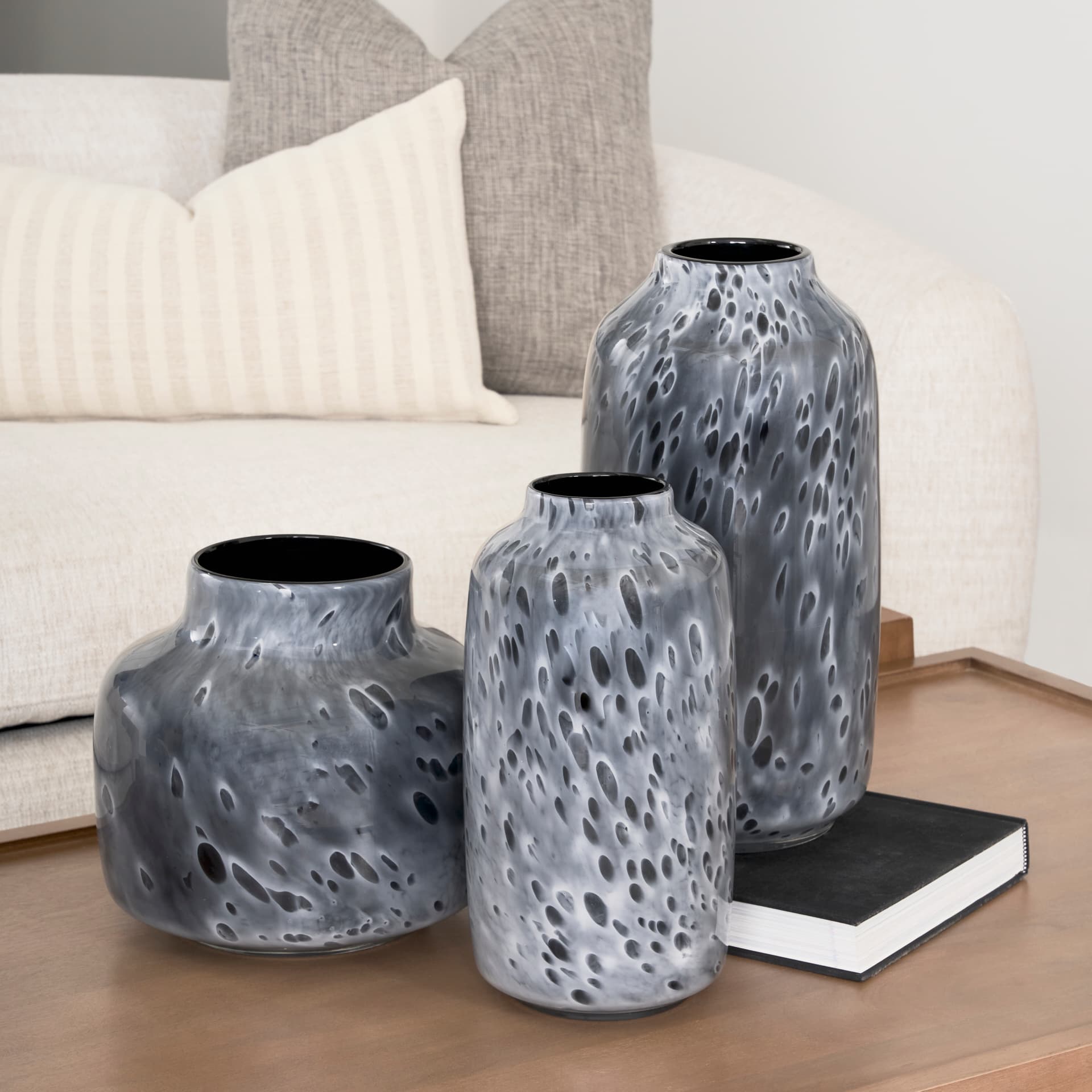 Masai Large Black Mottled Glass Vase — in a styled room