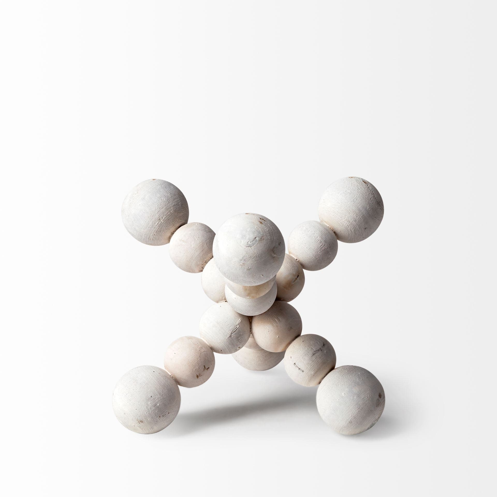 Carrollton I (Small) 7L x 7W Off-White Geometric Wood Ball Jack — product photograph
