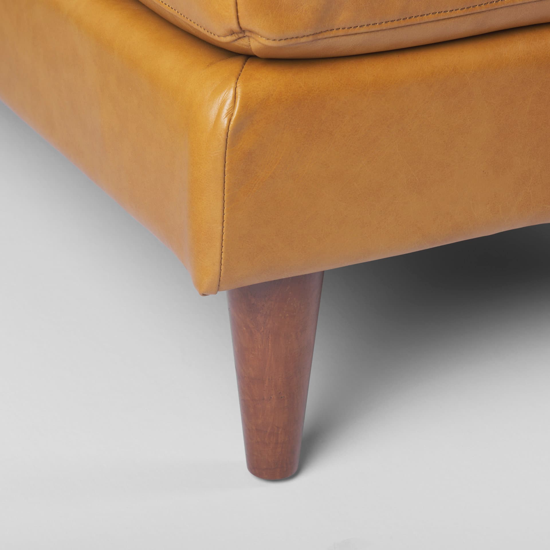 Svend 111.4L x 68.0W x 33.9H Tan Leather Right Chaise Sectional Sofa — product photograph