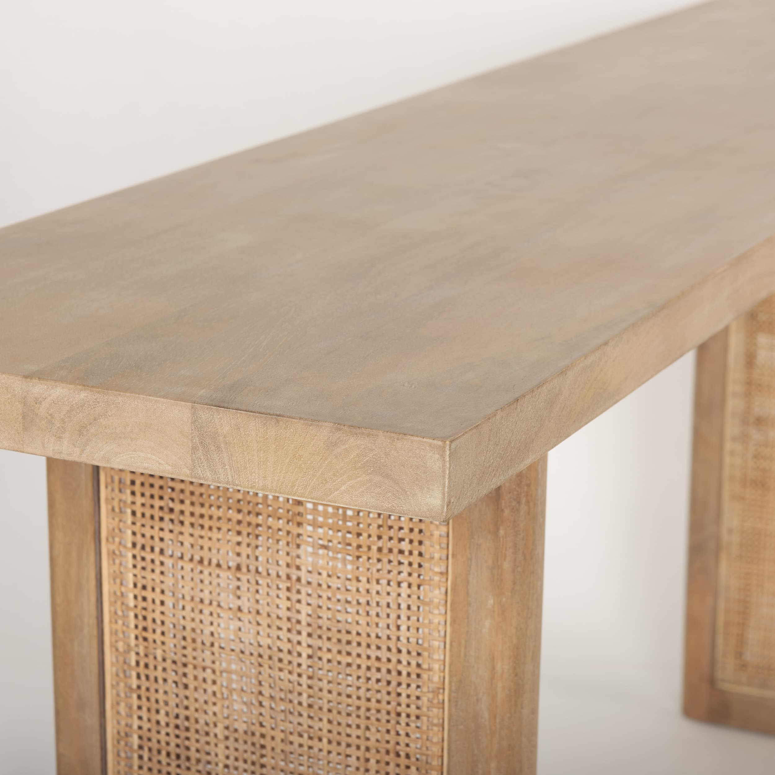 Grier 65" Light Brown Solid Wood w/ Cane Console Table — product photograph