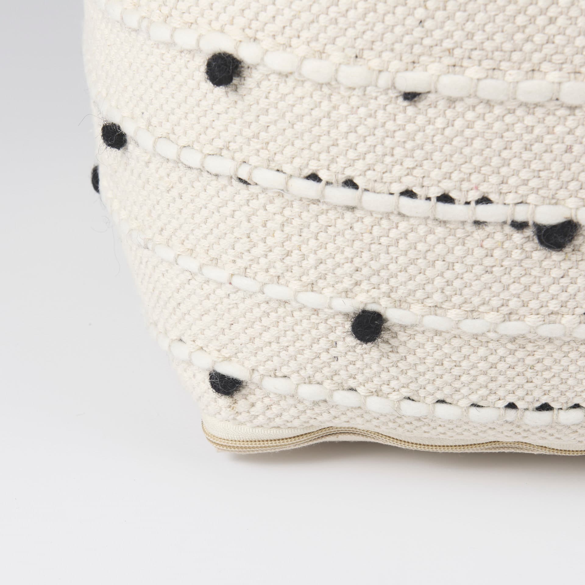 Amaira 16.0L x 16.0W x 16.0H Cream/Black/White patterned Wool and Cotton Pouf — product photograph