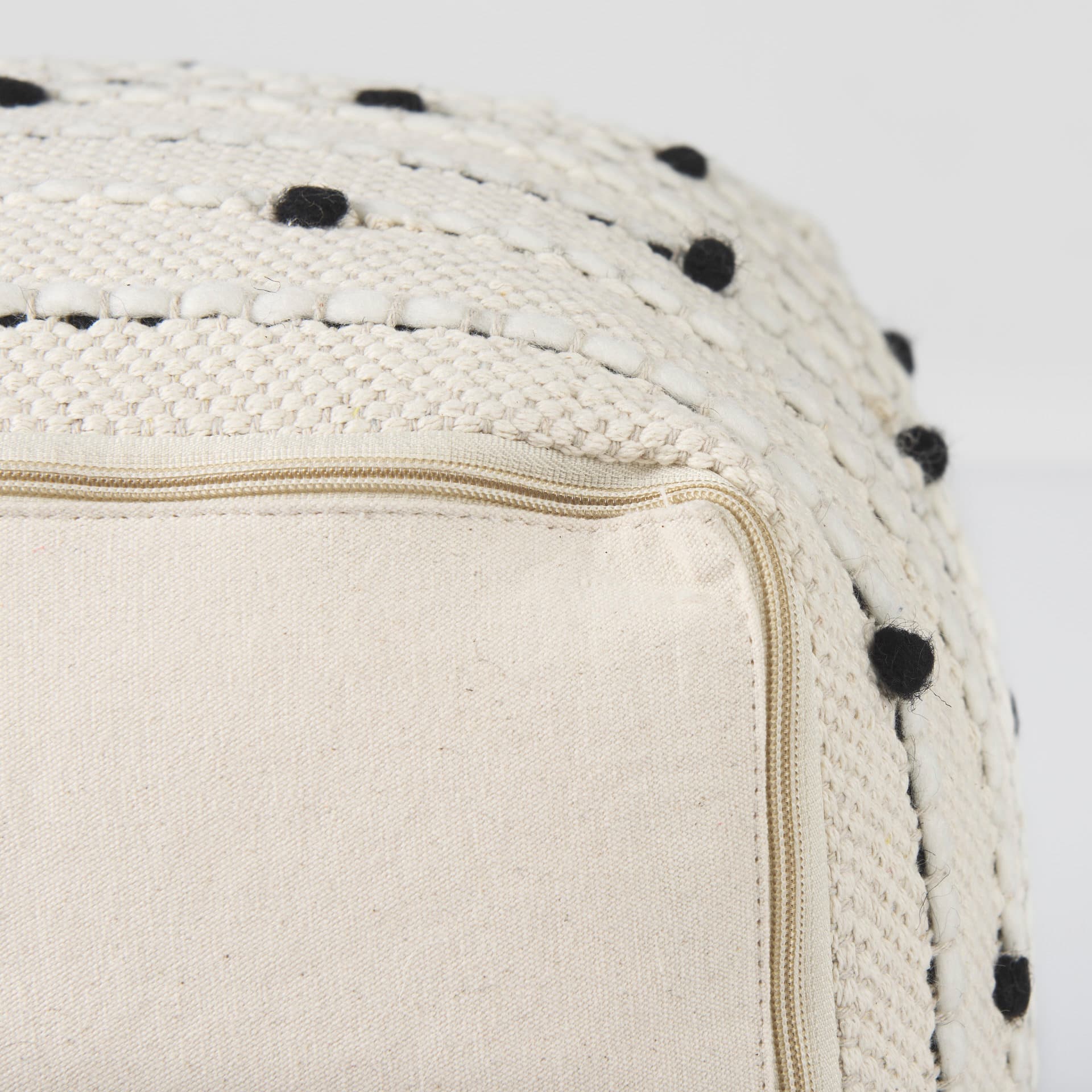 Amaira 16.0L x 16.0W x 16.0H Cream/Black/White patterned Wool and Cotton Pouf — product photograph