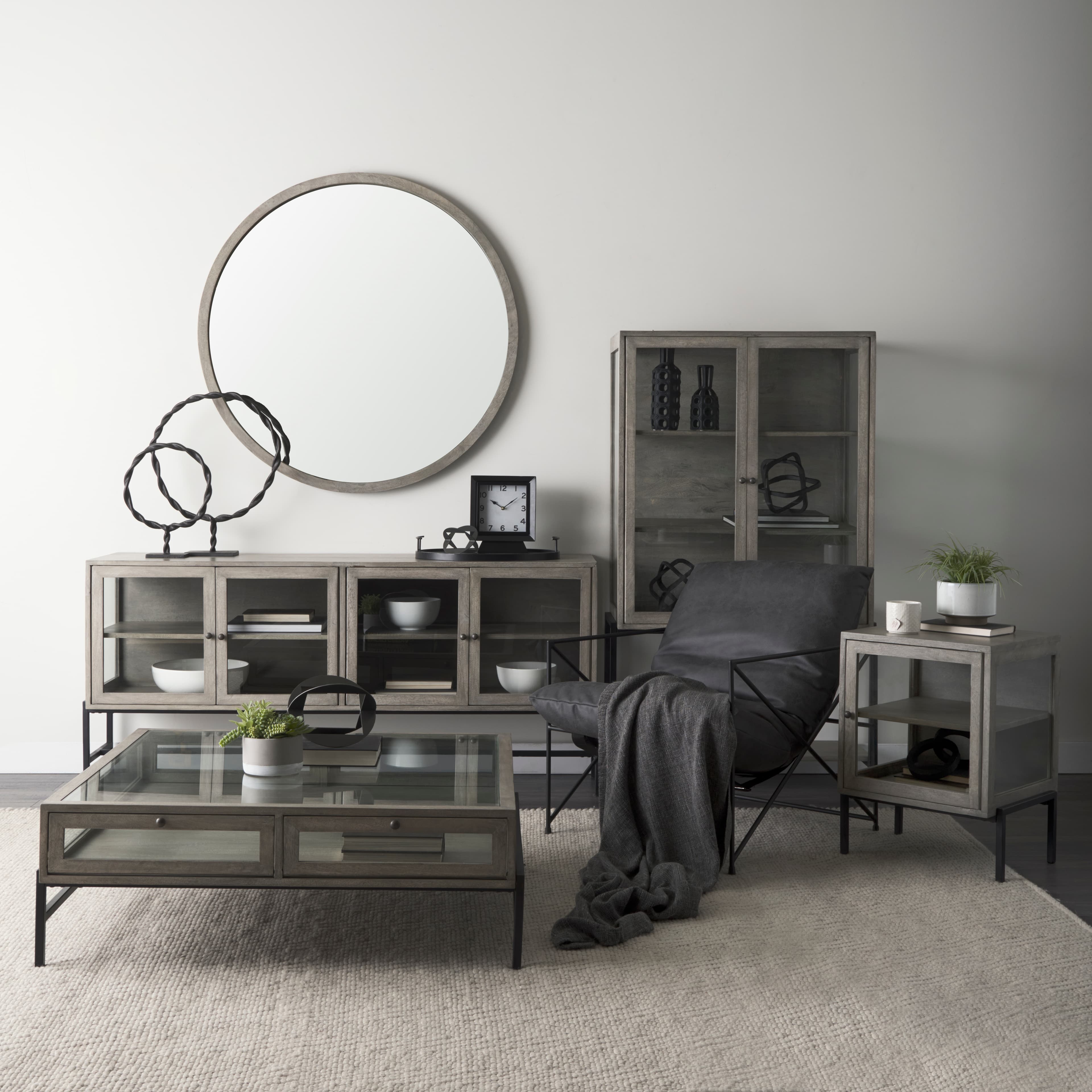 Gambit 46" Round Gray Wash Wood Frame Wall Mirror — in a styled room