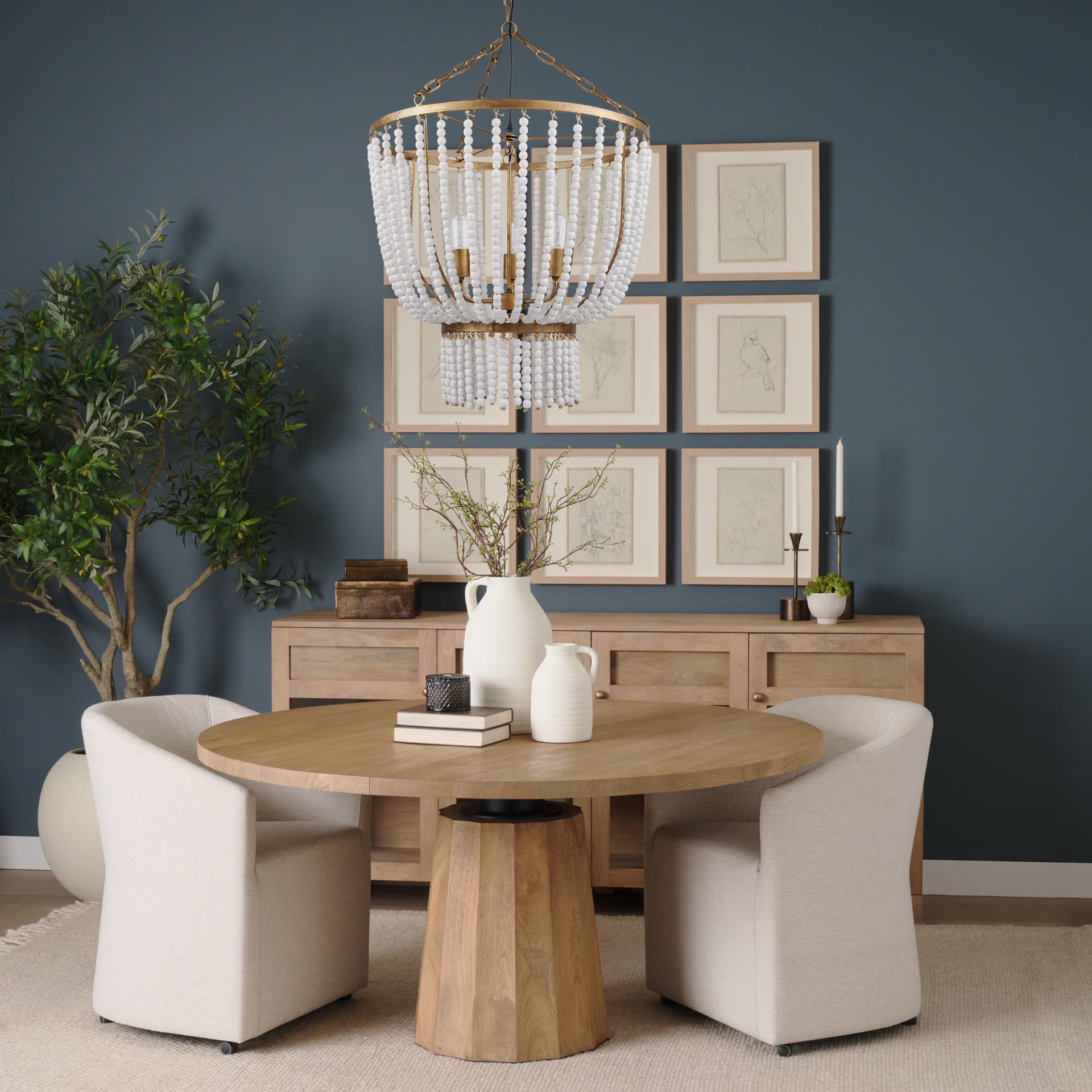 Rhone Gold Metal and Wood Beaded Chandelier — in a styled room