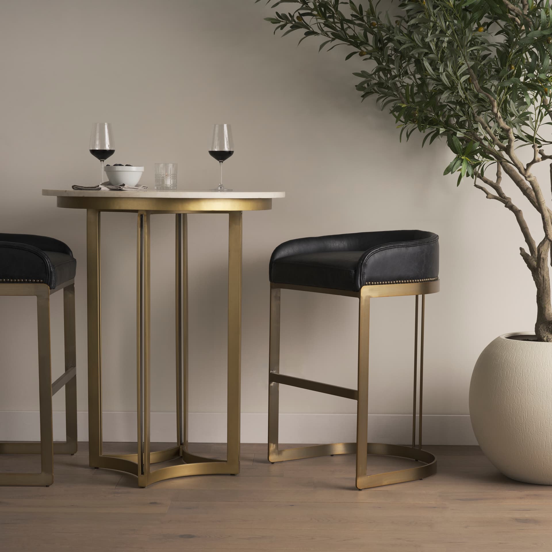 Hollyfield Low Back 28.75in Seat Bar Stool | Charcoal Brown Leather — in a styled room