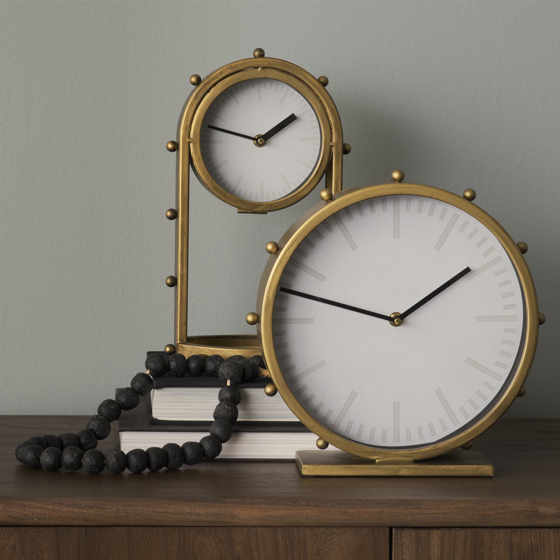 Marian 7.5L x 5.7W x 13.0H Gold Studded Table Clock — in a styled room